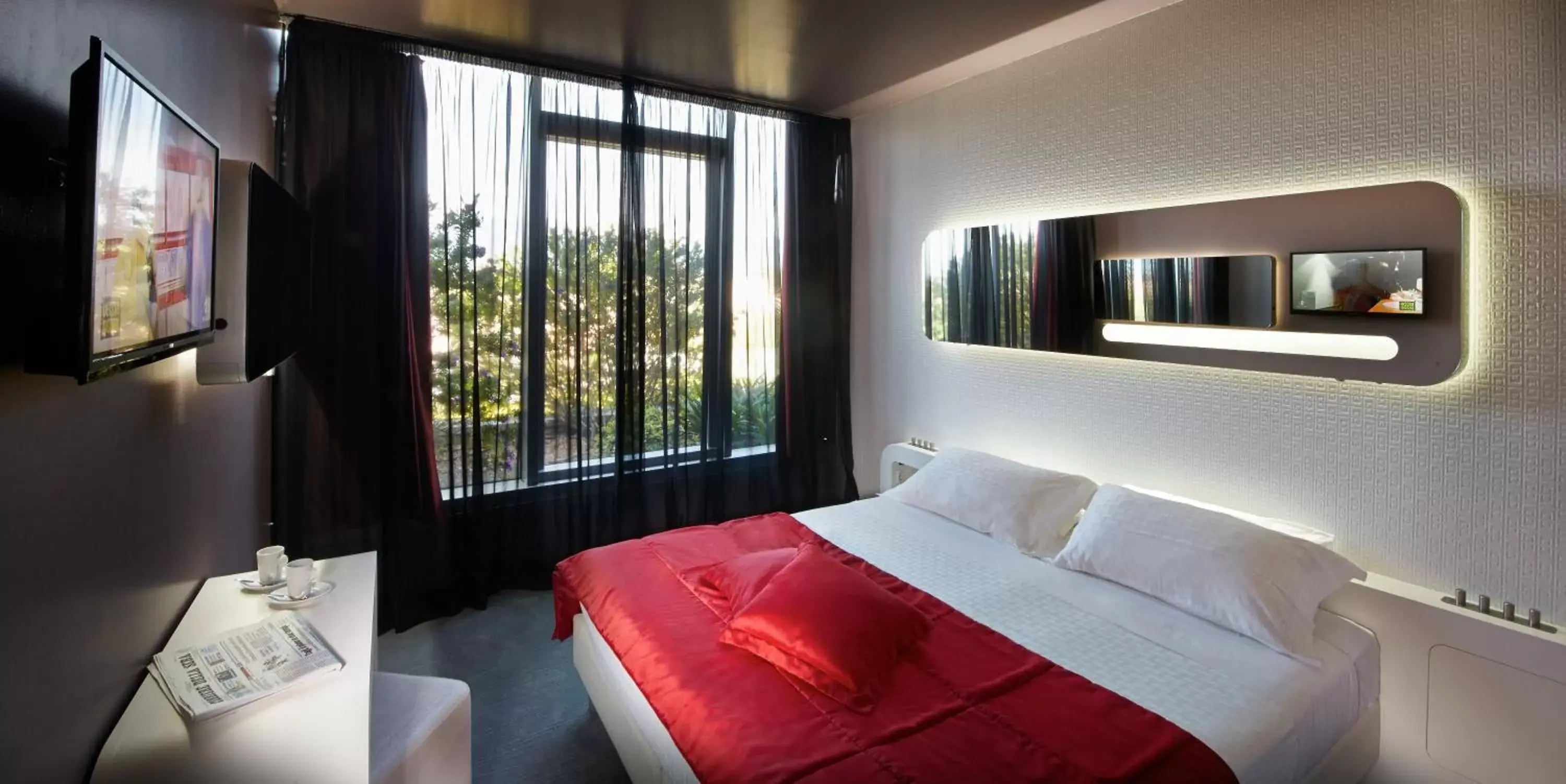 Bed, Seating Area in San Ranieri Hotel