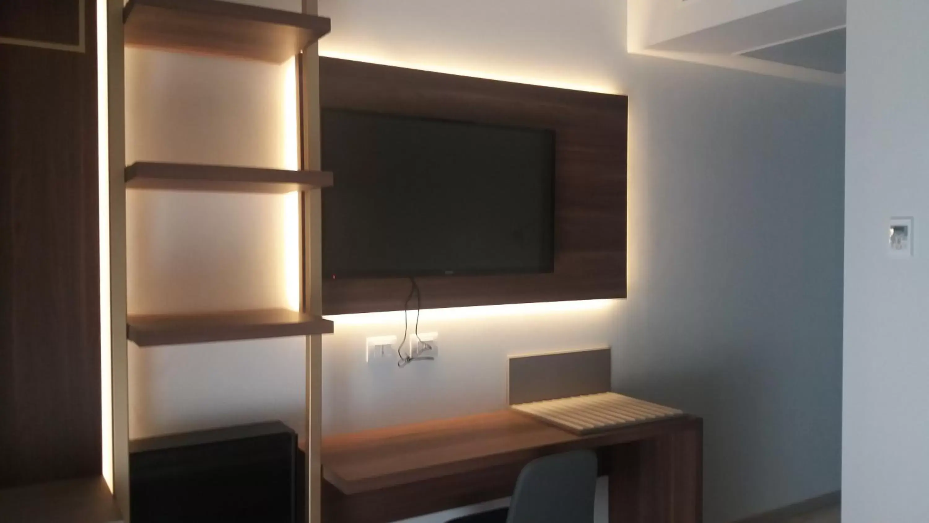 TV and multimedia, TV/Entertainment Center in 8room Hotel