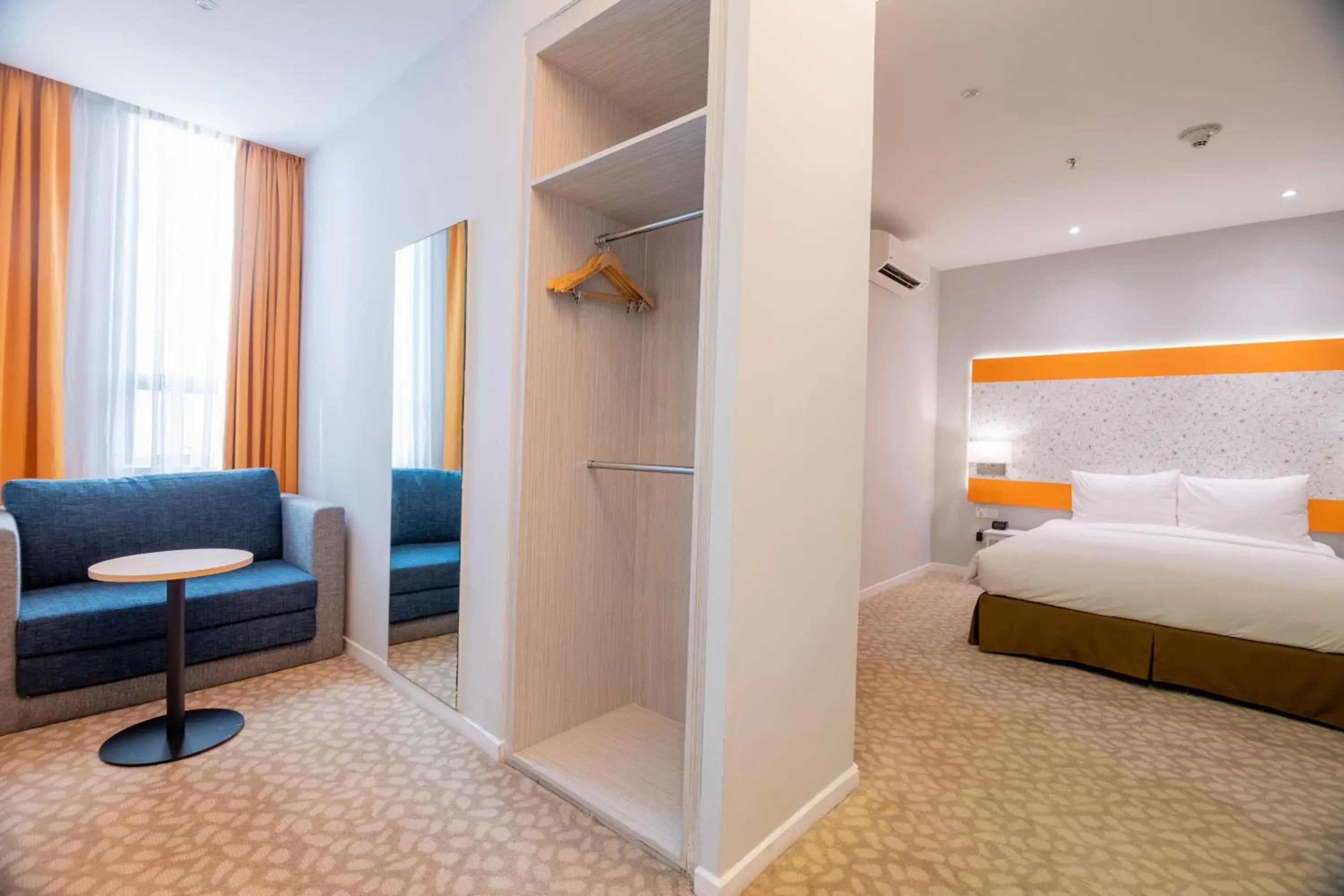 Bed in Holiday Inn Express & Suites Johor Bahru, an IHG Hotel