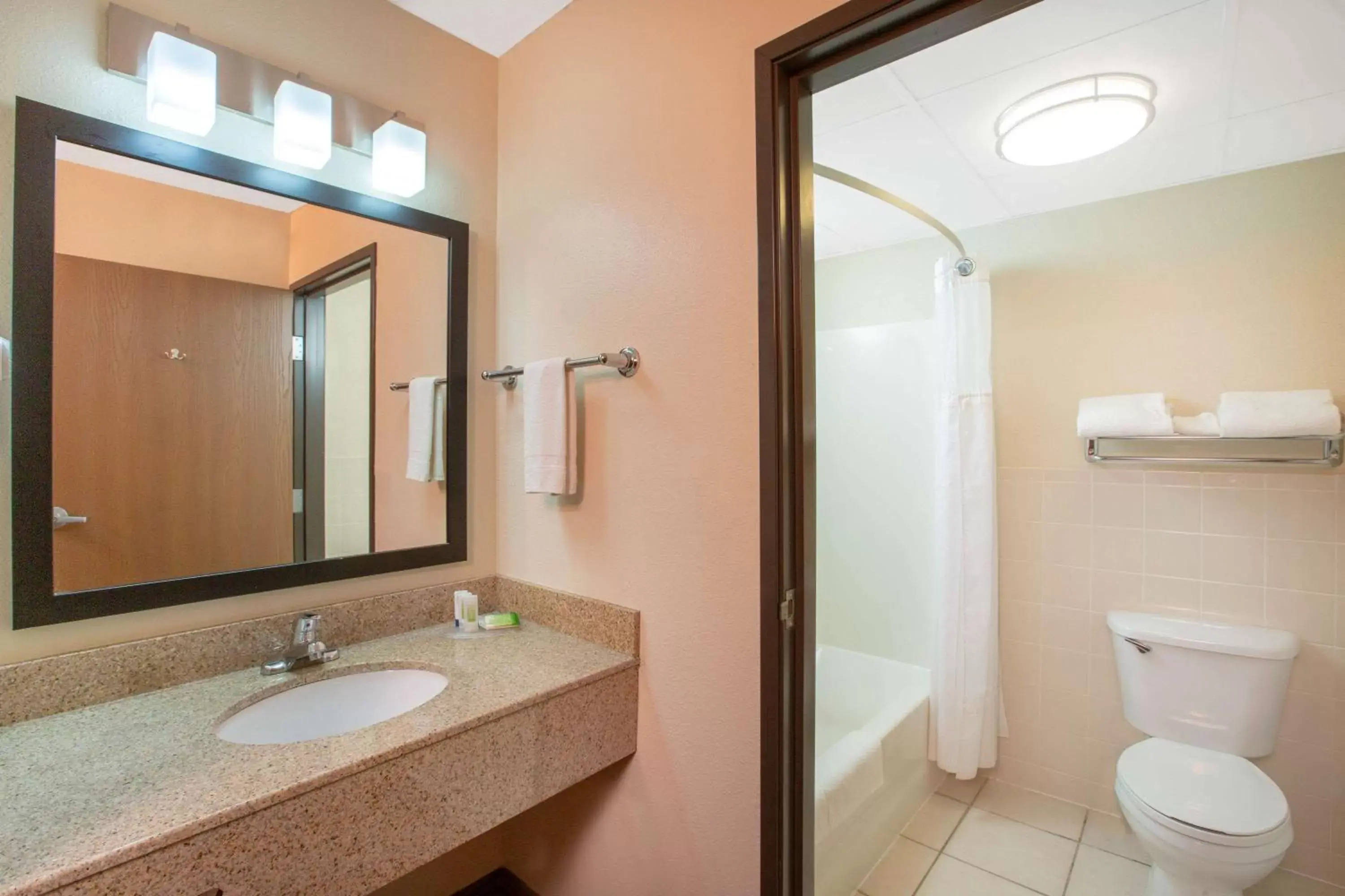 Photo of the whole room, Bathroom in AmericInn by Wyndham Muscatine