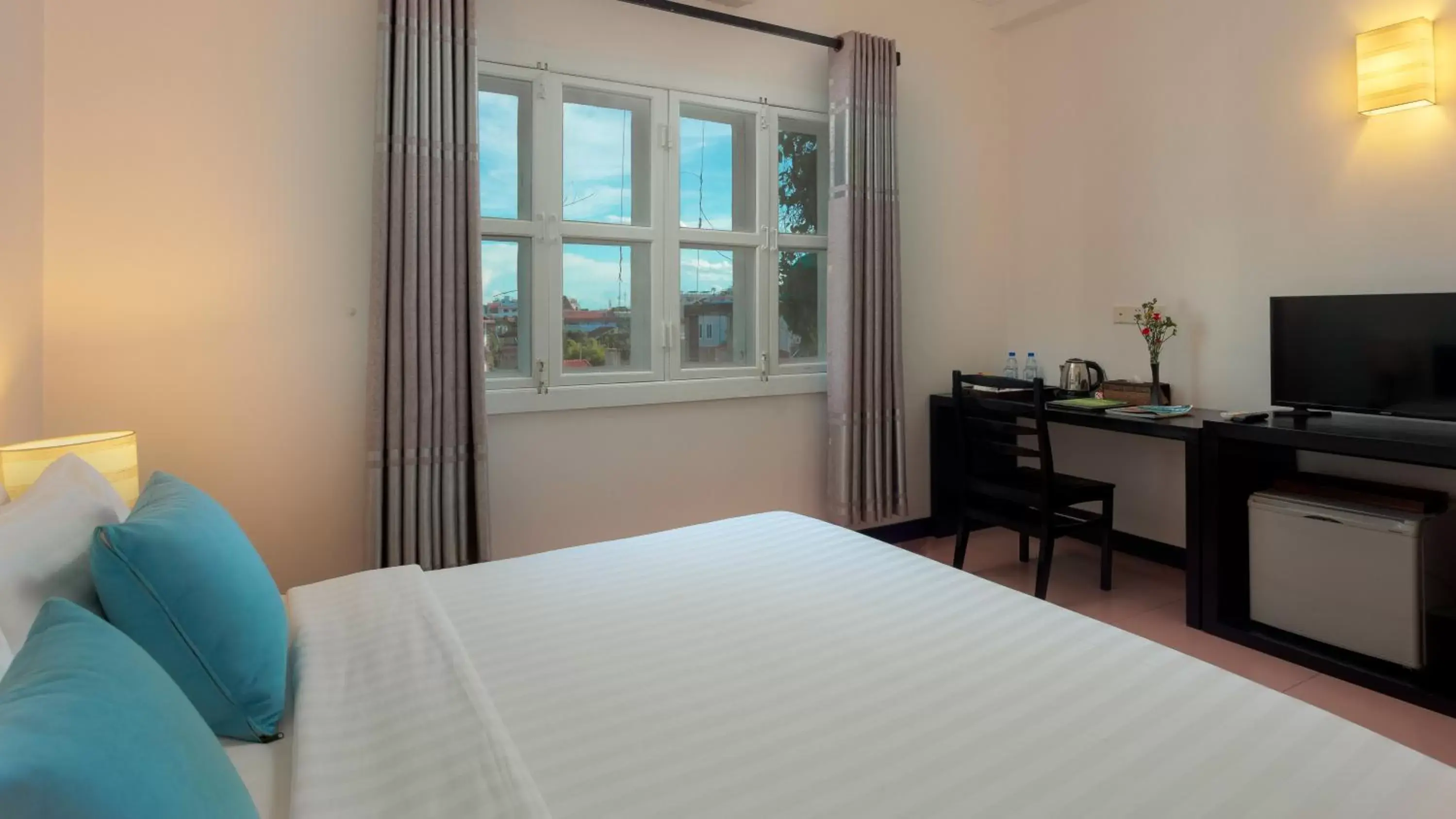 Bed in Amber Angkor Villa Hotel & Spa