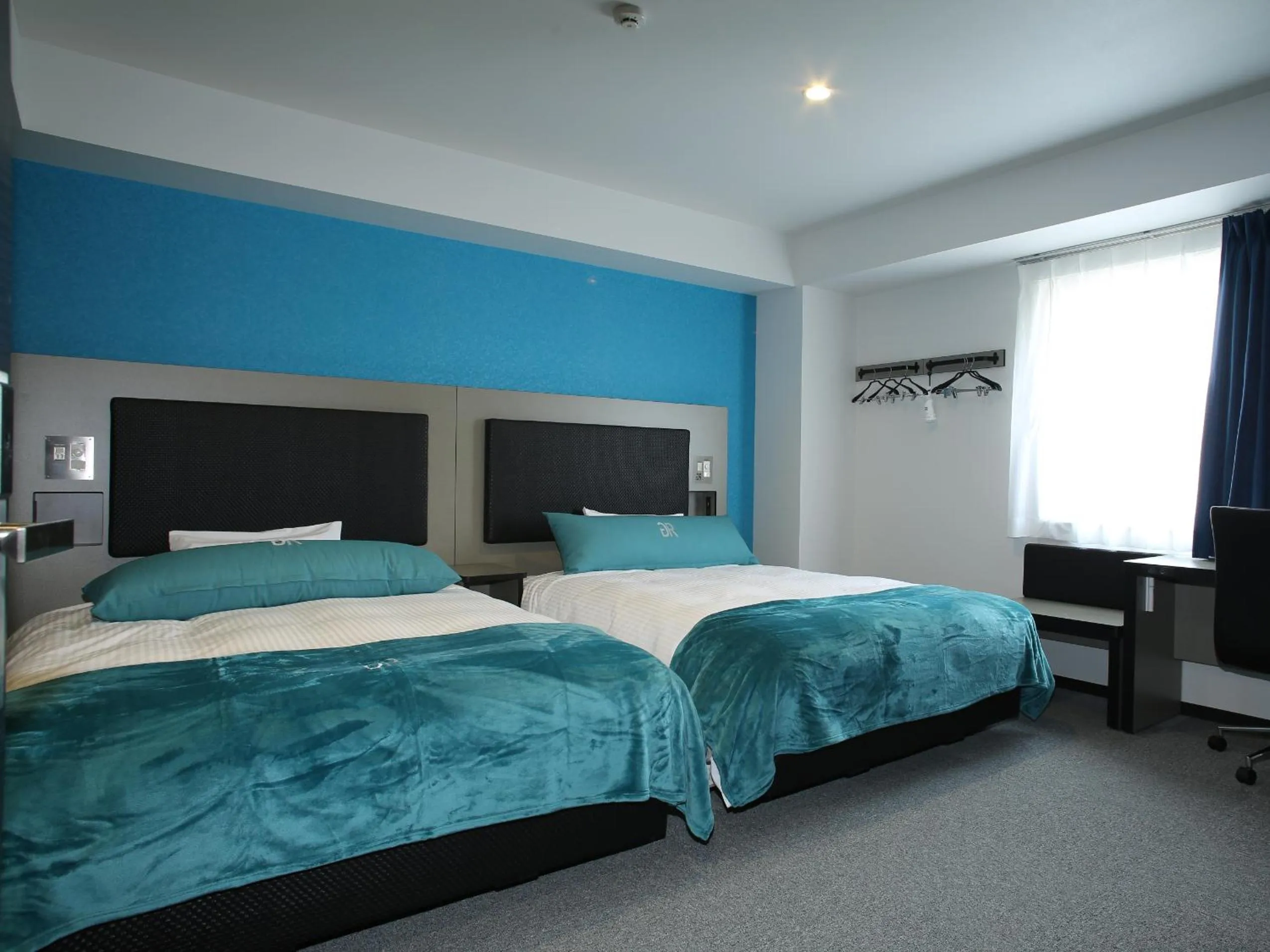 Photo of the whole room, Bed in Green Rich Hotel & Capsule Naha - Artificial hot spring Futamata Yunohana