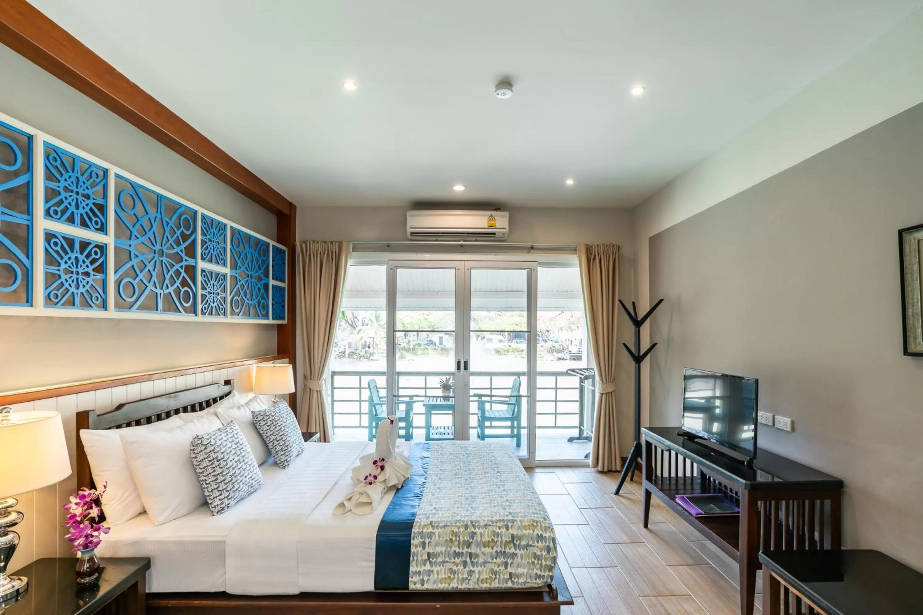 Bed in Le Charme Sukhothai Historical Park