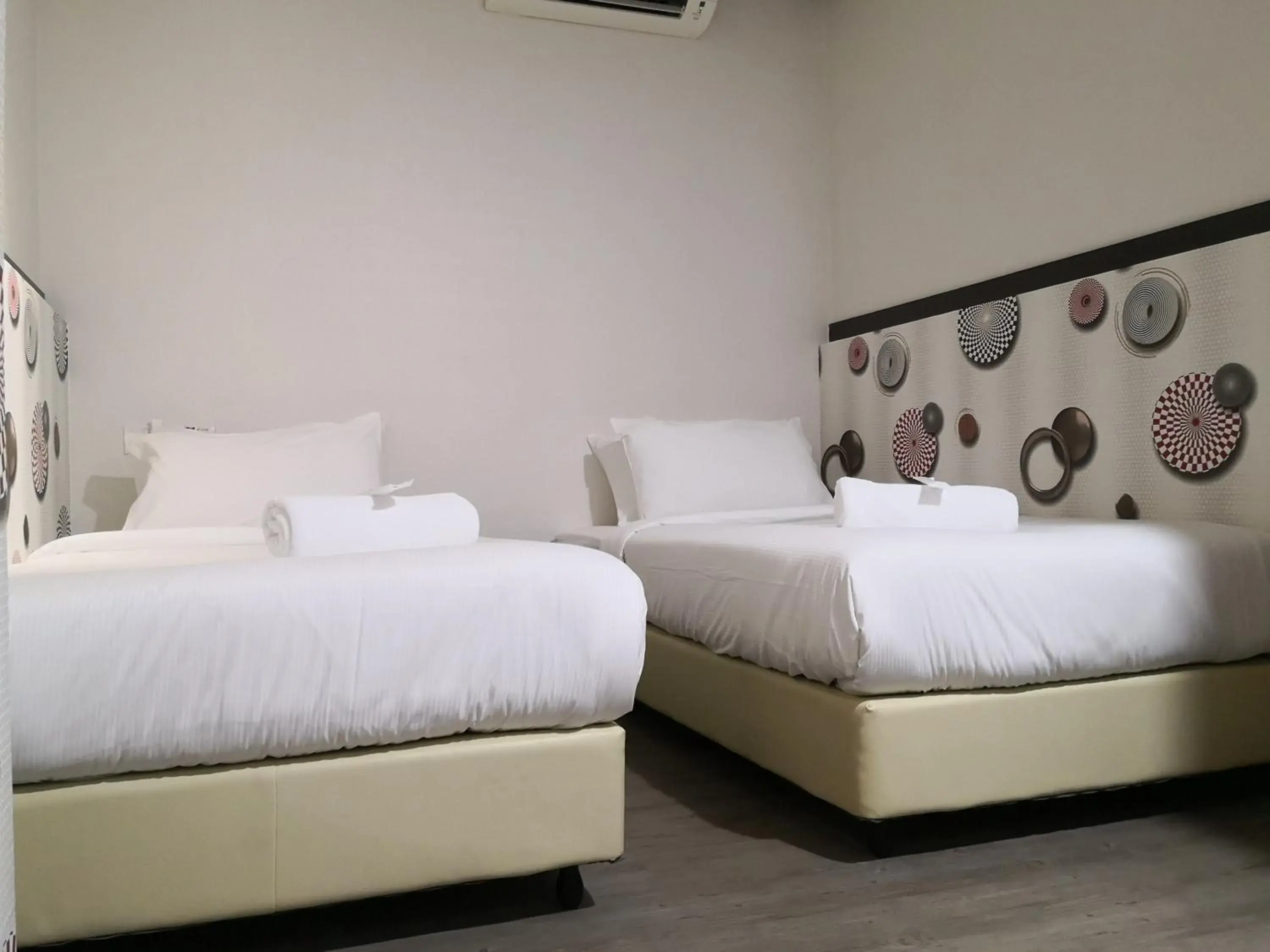 Bed in Vivids Hotel