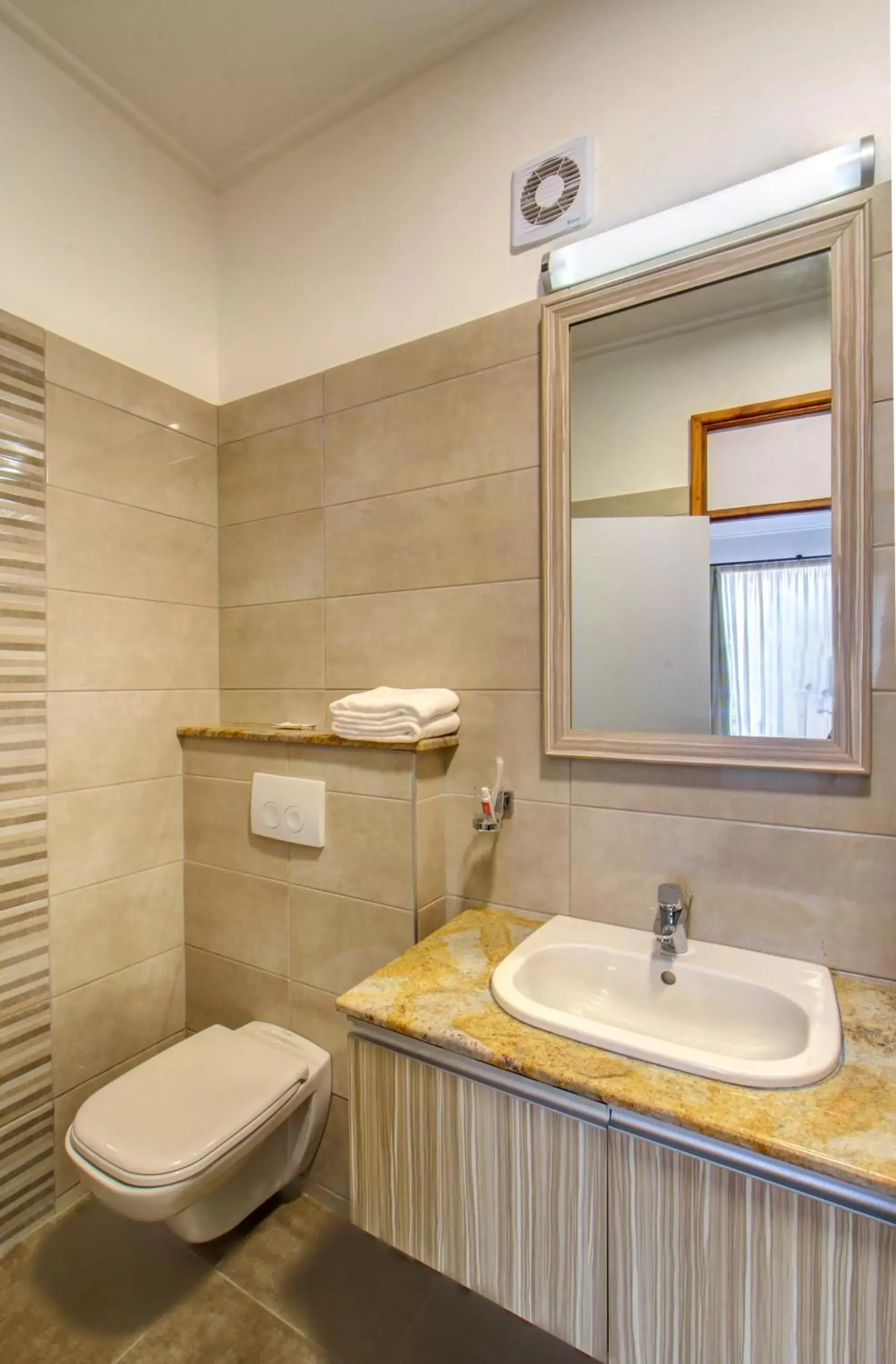 Toilet, Bathroom in Executive Residency by Best Western Nairobi
