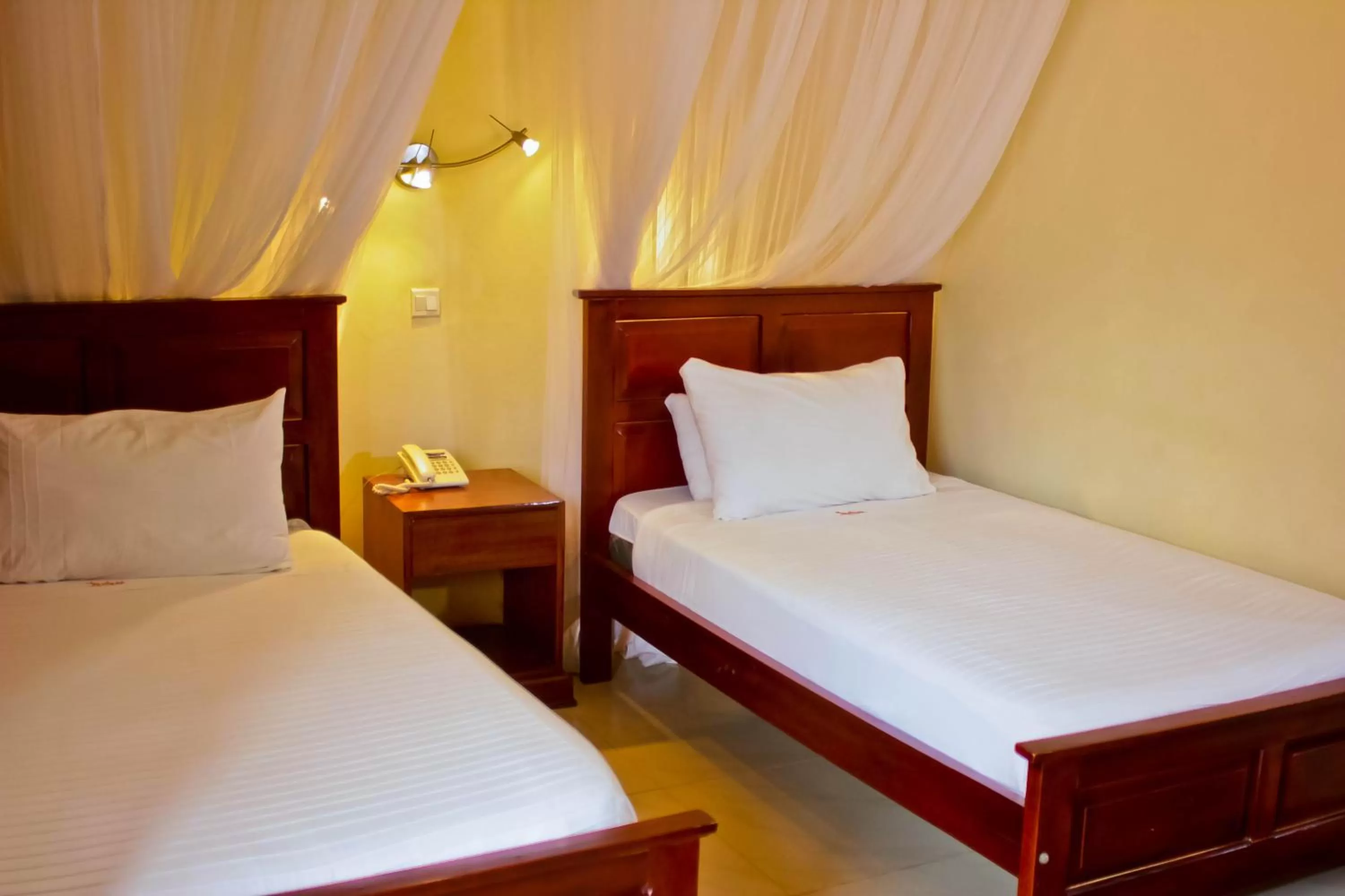 Bed in Al-Nisaa Hotel and Spa