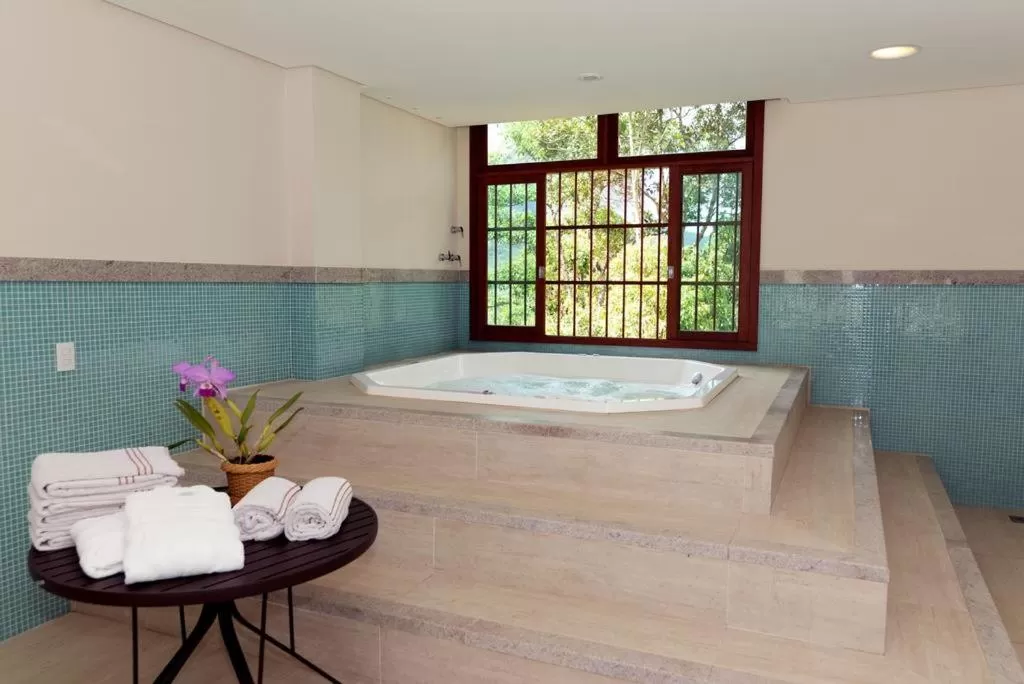 Hot Tub in Apart Hotel Vista Azul - hospedagem nas montanhas