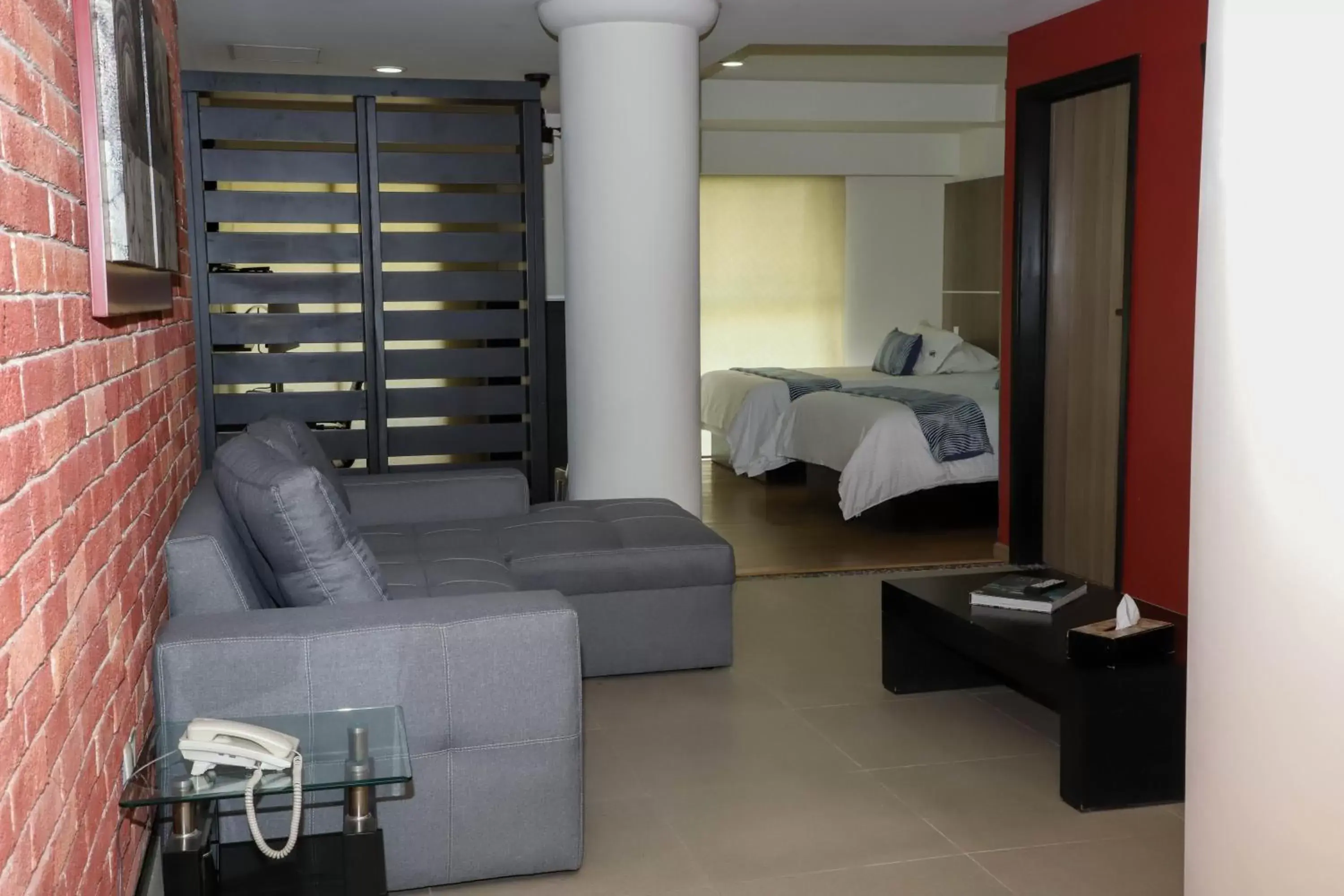 Bed, Seating Area in Capital Luxury Apartments & Offices