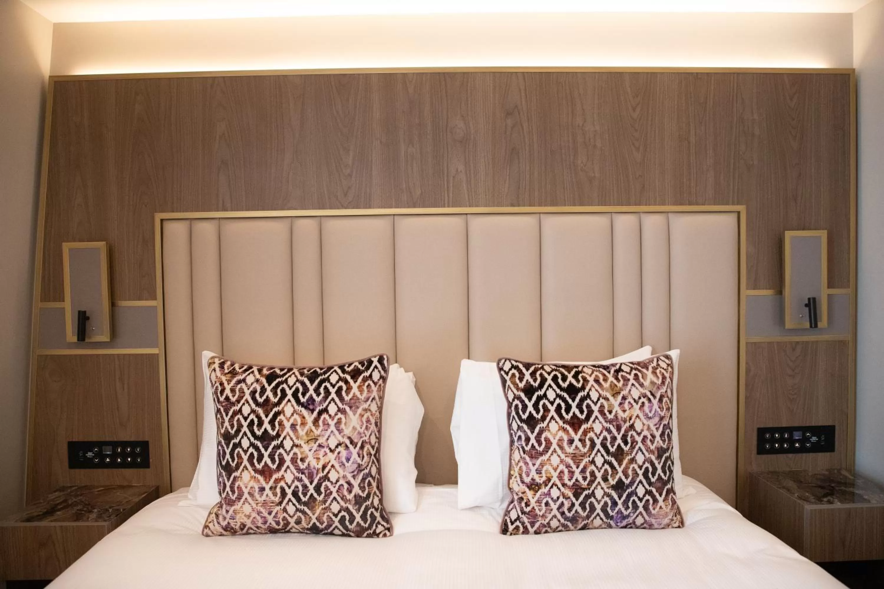 Bed in Merit Kensington Hotel