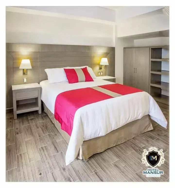 Bed in Hotel Mansur Business & Leisure