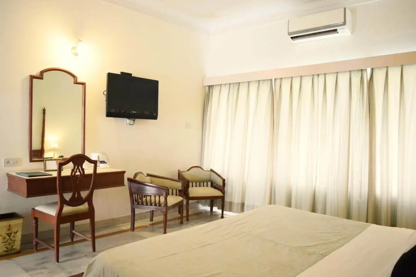 Photo of the whole room, Bed in Rampratap Palace by Fateh Collection Photo of the whole room, Bed in Rampratap Palace by Fateh Collection
