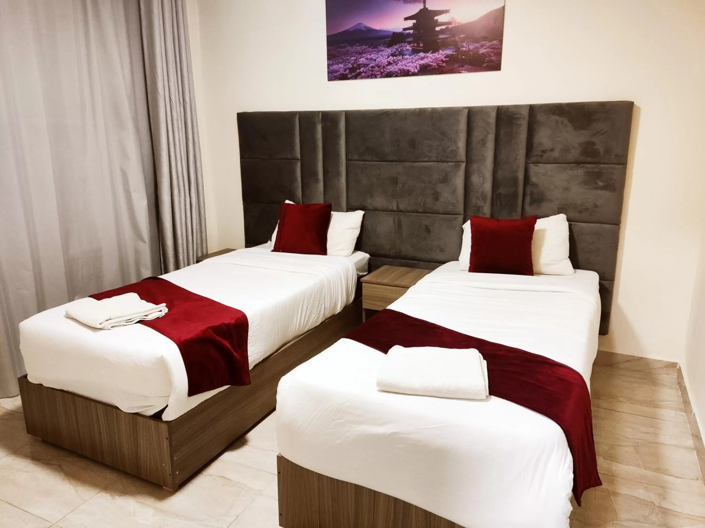 Bed in Golden Plaza Hotel