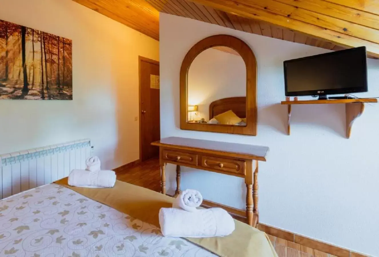 Bed, TV/Entertainment Center in Pey Resort