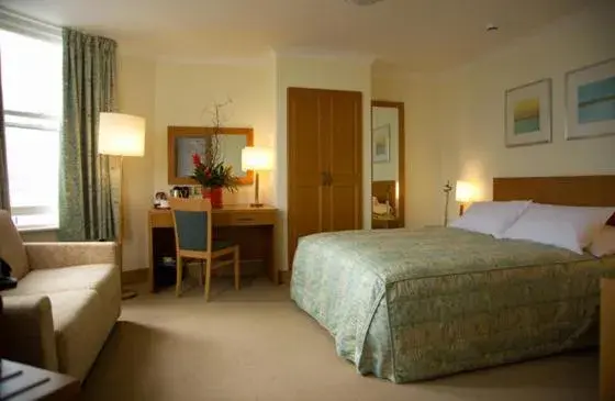 Photo of the whole room, Bed in The Rutland Hotel