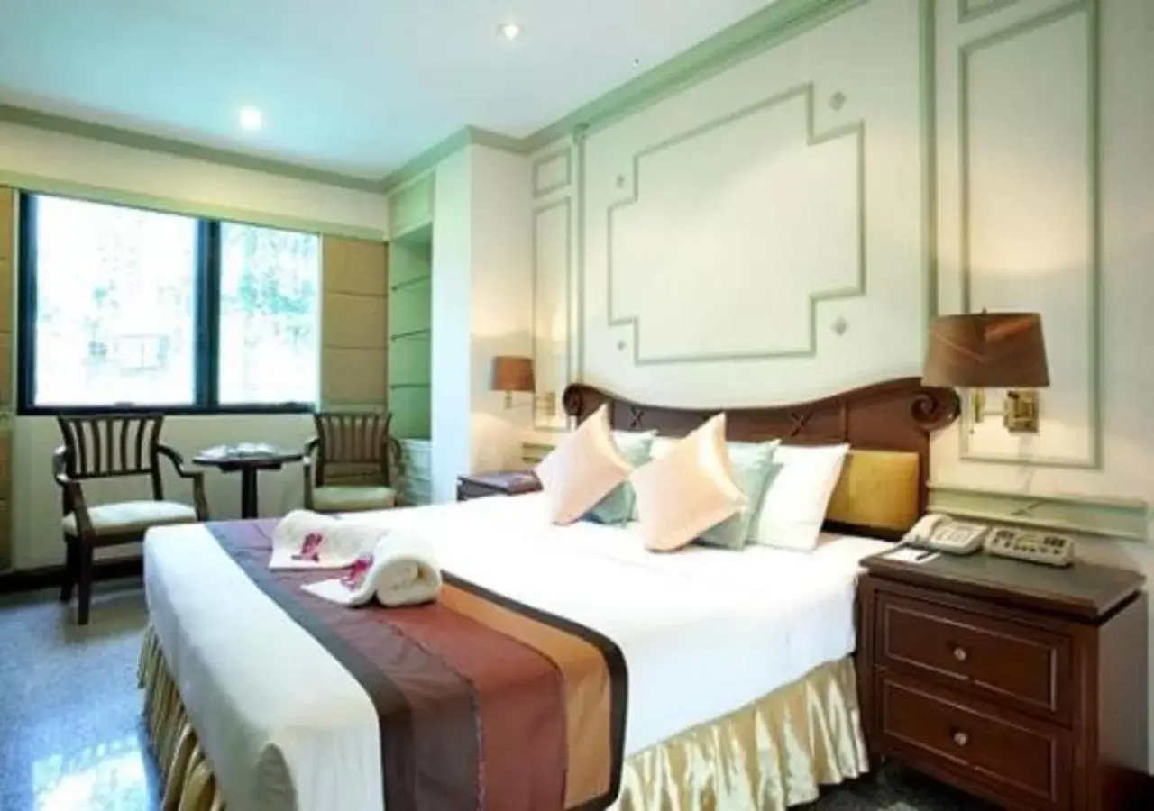 Bedroom in Majestic Suites Hotel