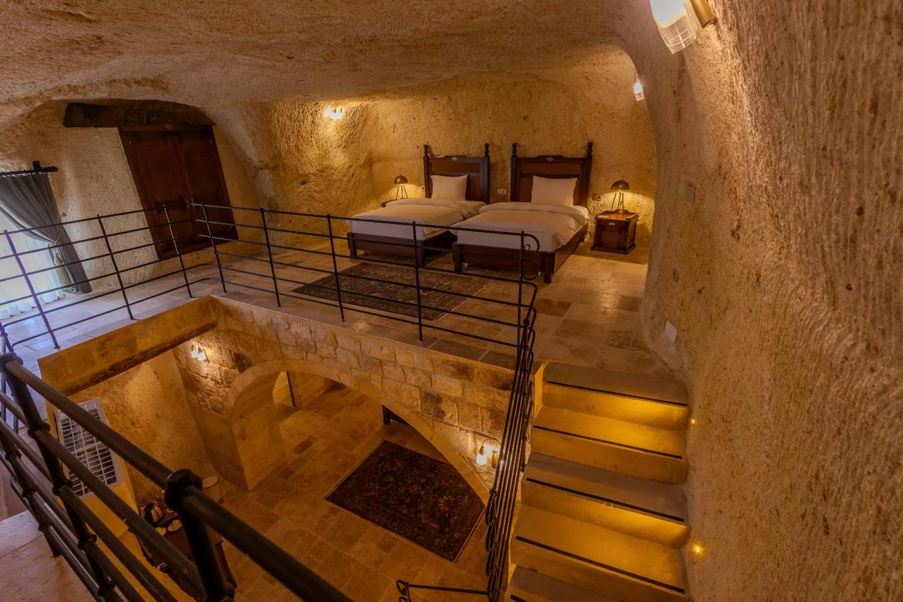 Bed in Seraphim Cave Suites & SPA