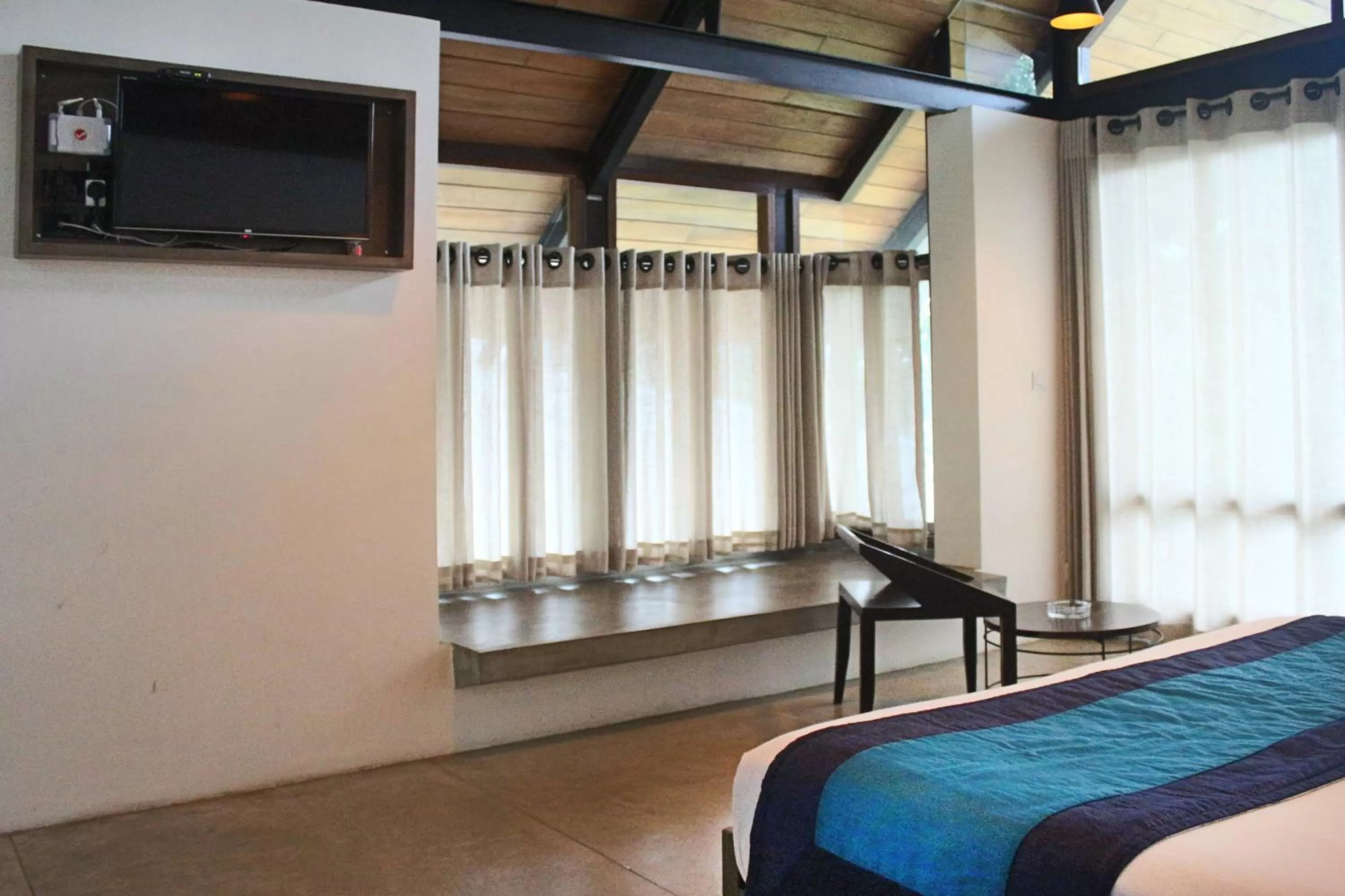 Bedroom, TV/Entertainment Center in swp eco lodge