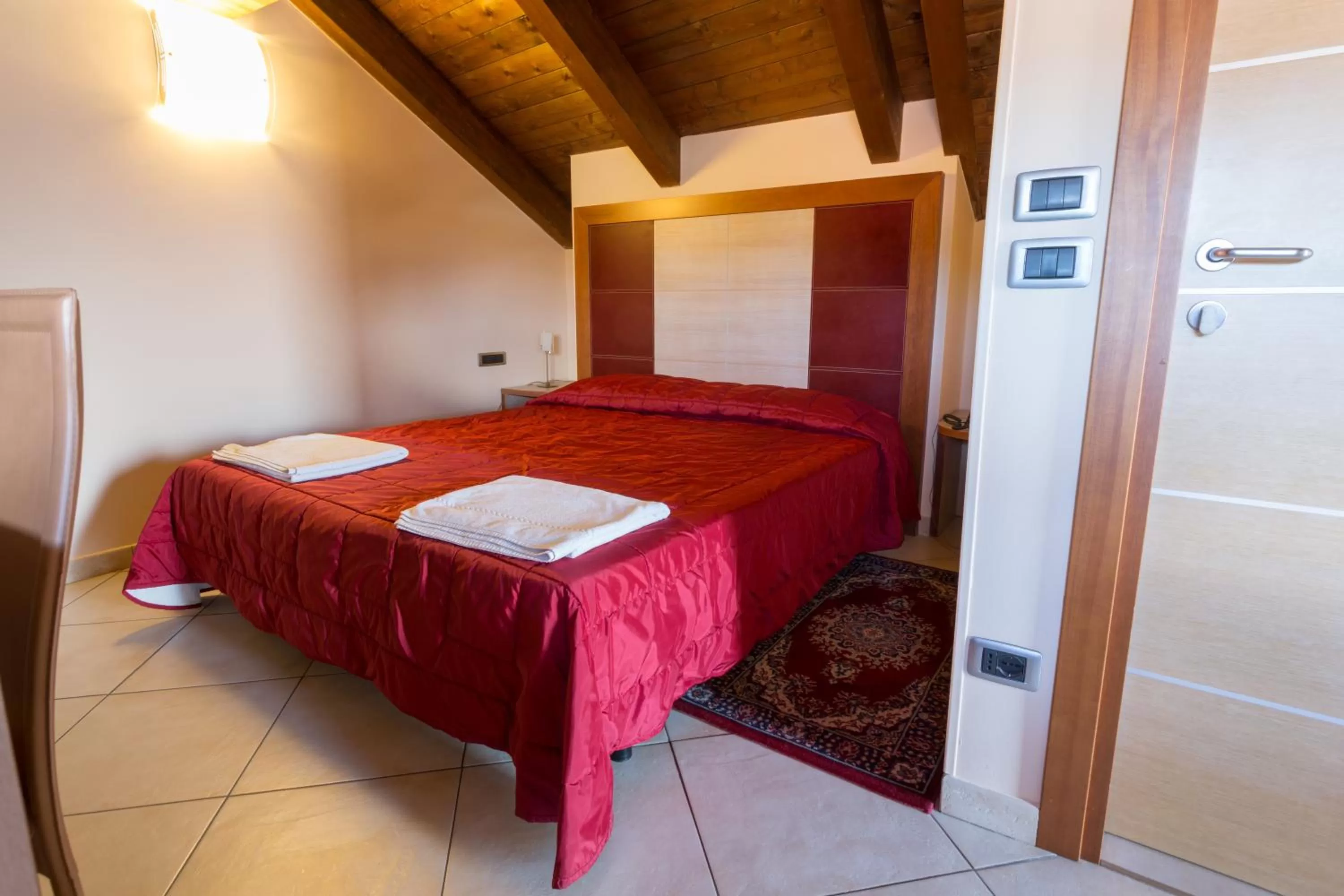 Bed in Hotel Conte Ruggero