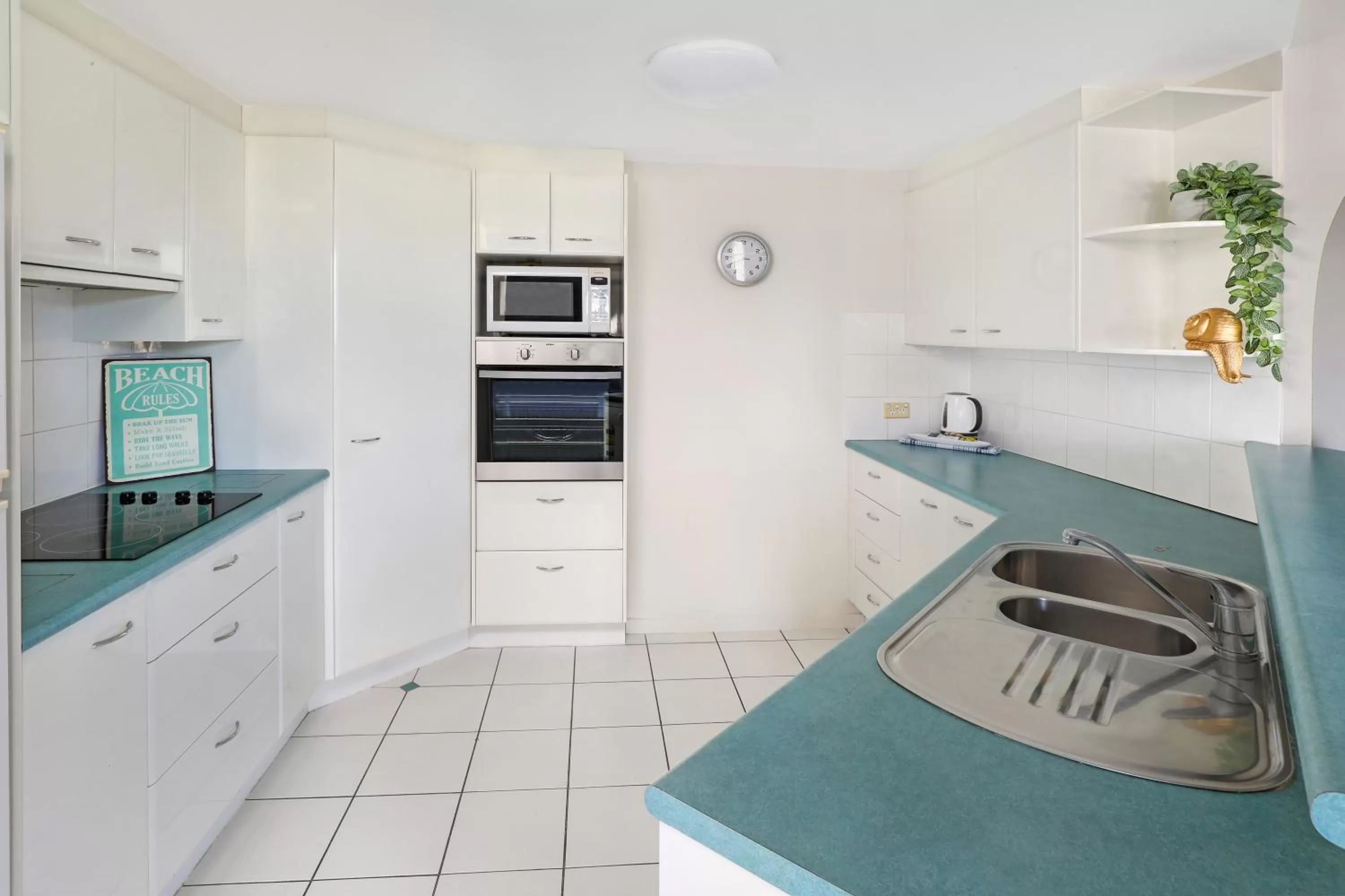 kitchen in Beachside Resort Kawana Waters