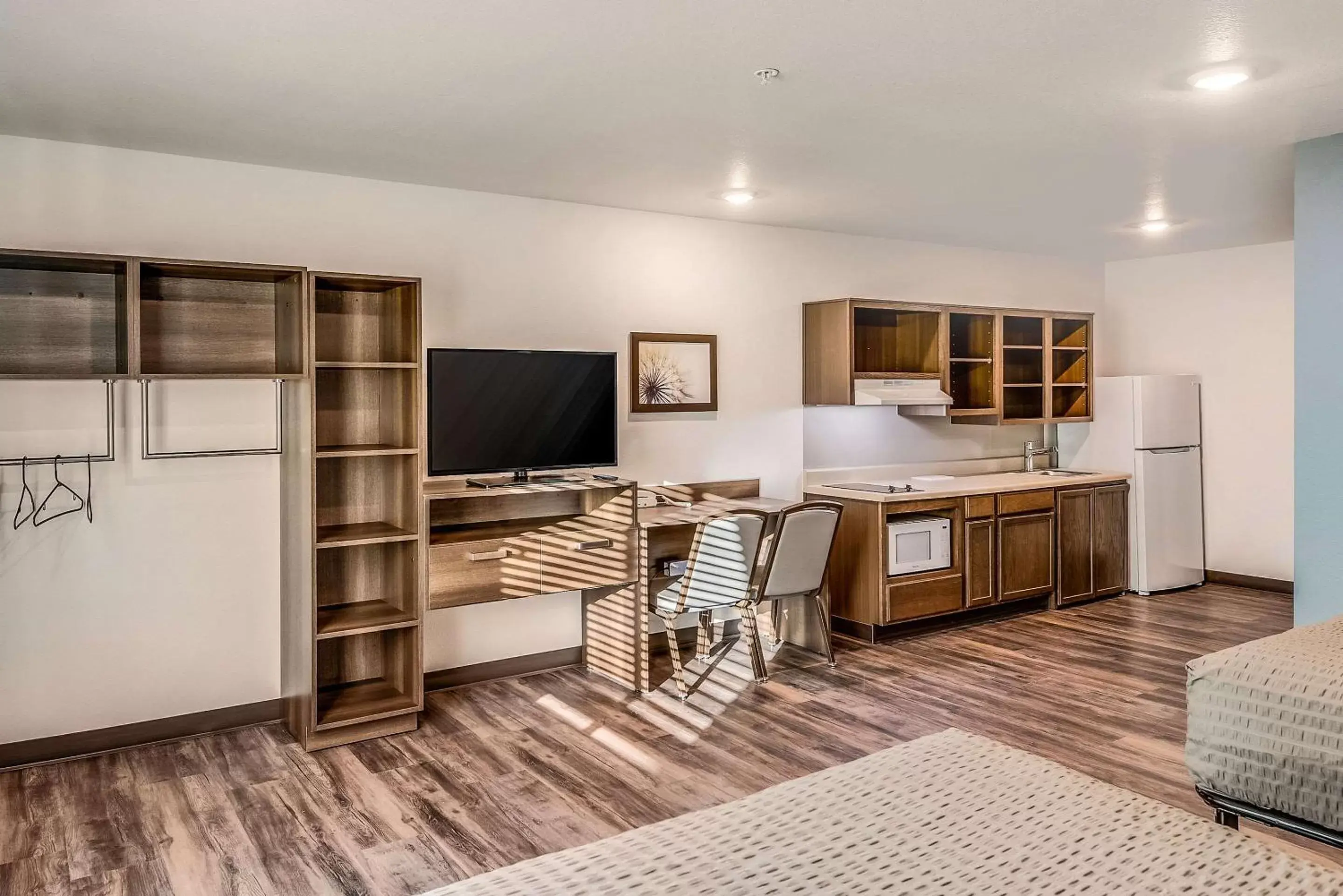 Photo of the whole room, Kitchen/Kitchenette in WoodSpring Suites West Des Moines