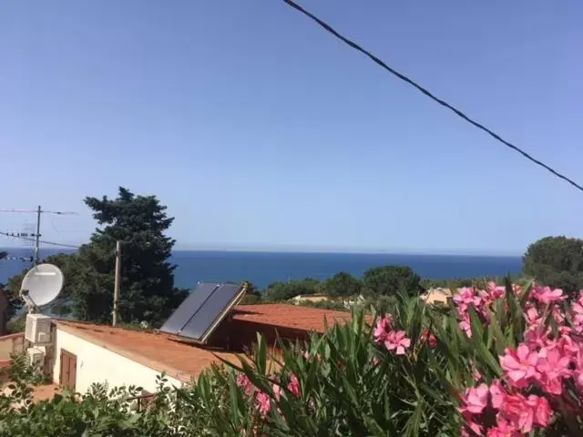 Stanza in Villa con giardino vista mare