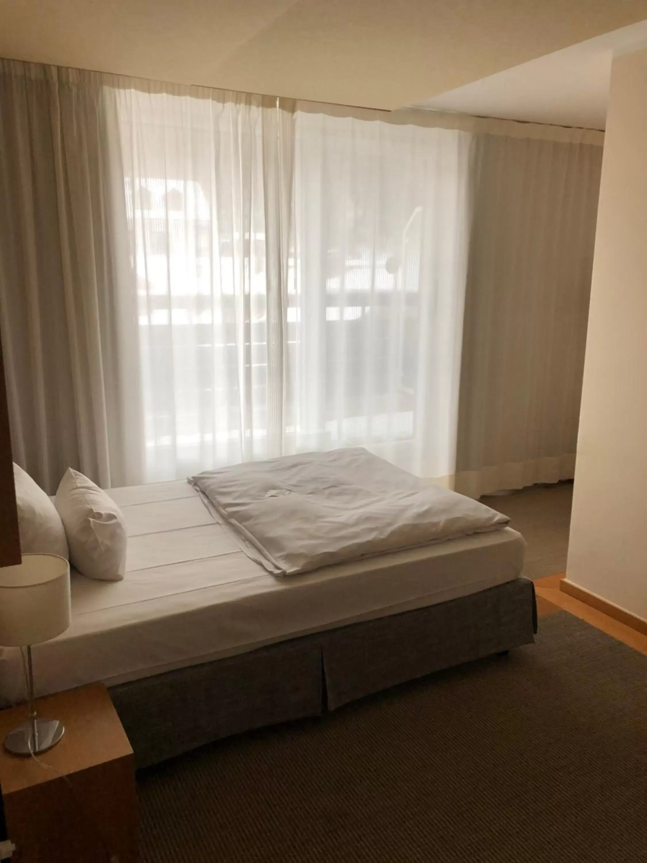 Photo of the whole room, Bed in Seehotel Leoni