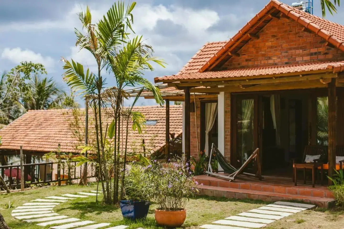 Deluxe Family Bungalow with Sea View in Thanh Kieu Beach Resort Deluxe Family Bungalow with Sea View in Thanh Kieu Beach Resort