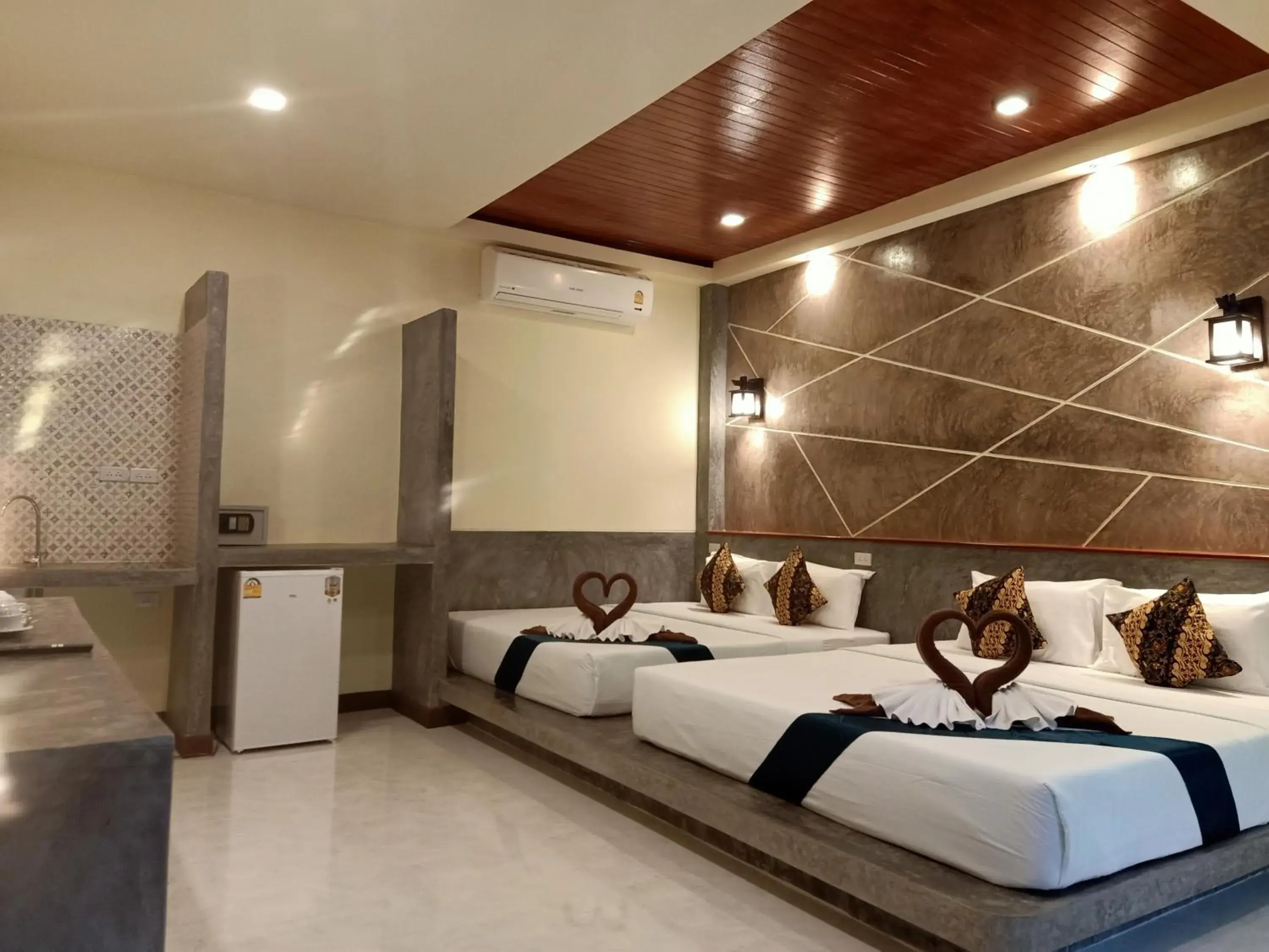 Bed in Lanta Pearl Beach Resort