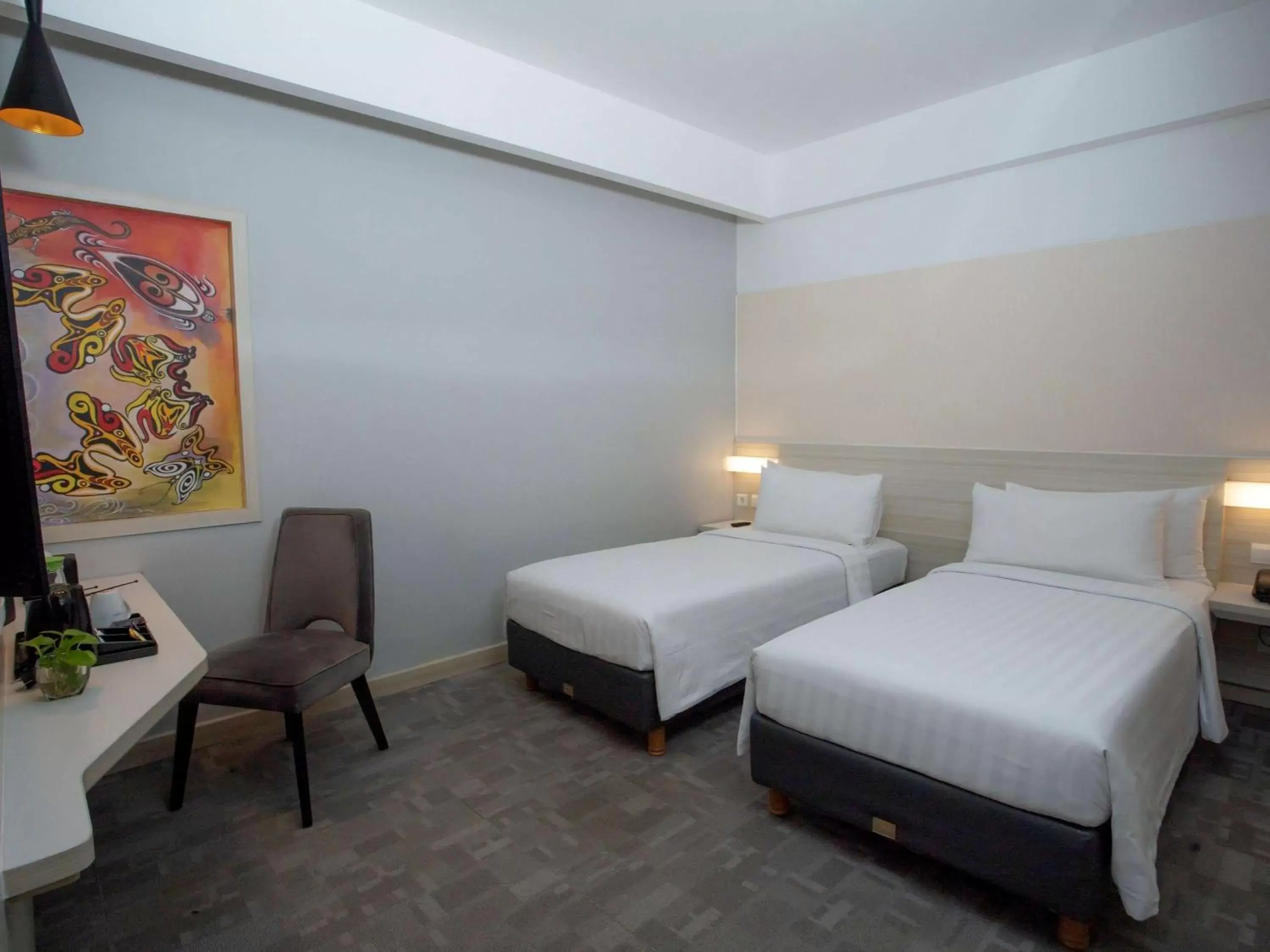 Photo of the whole room, Bed in Mercure Jayapura