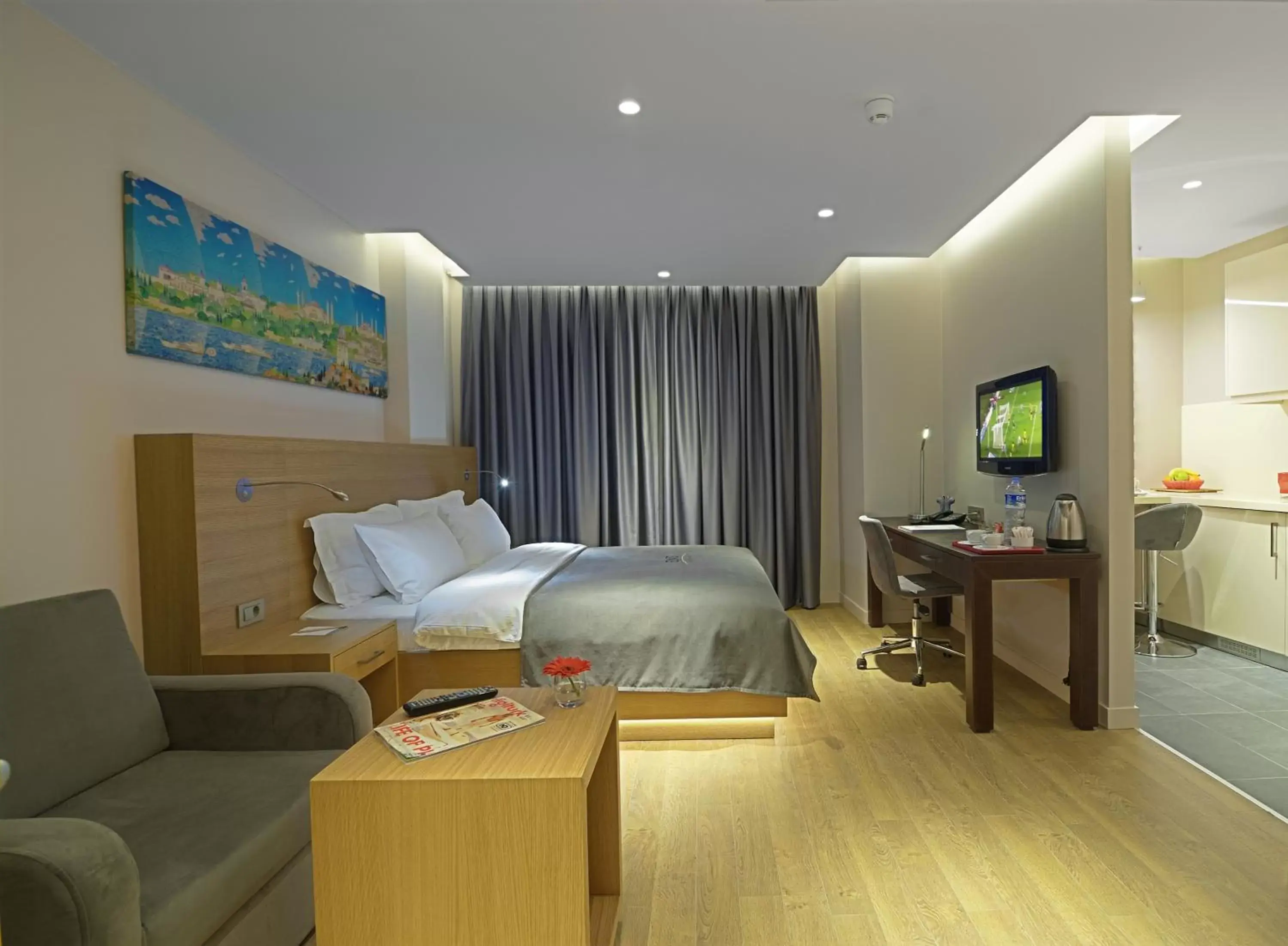 Bed, Seating Area in Endless Suites Taksim
