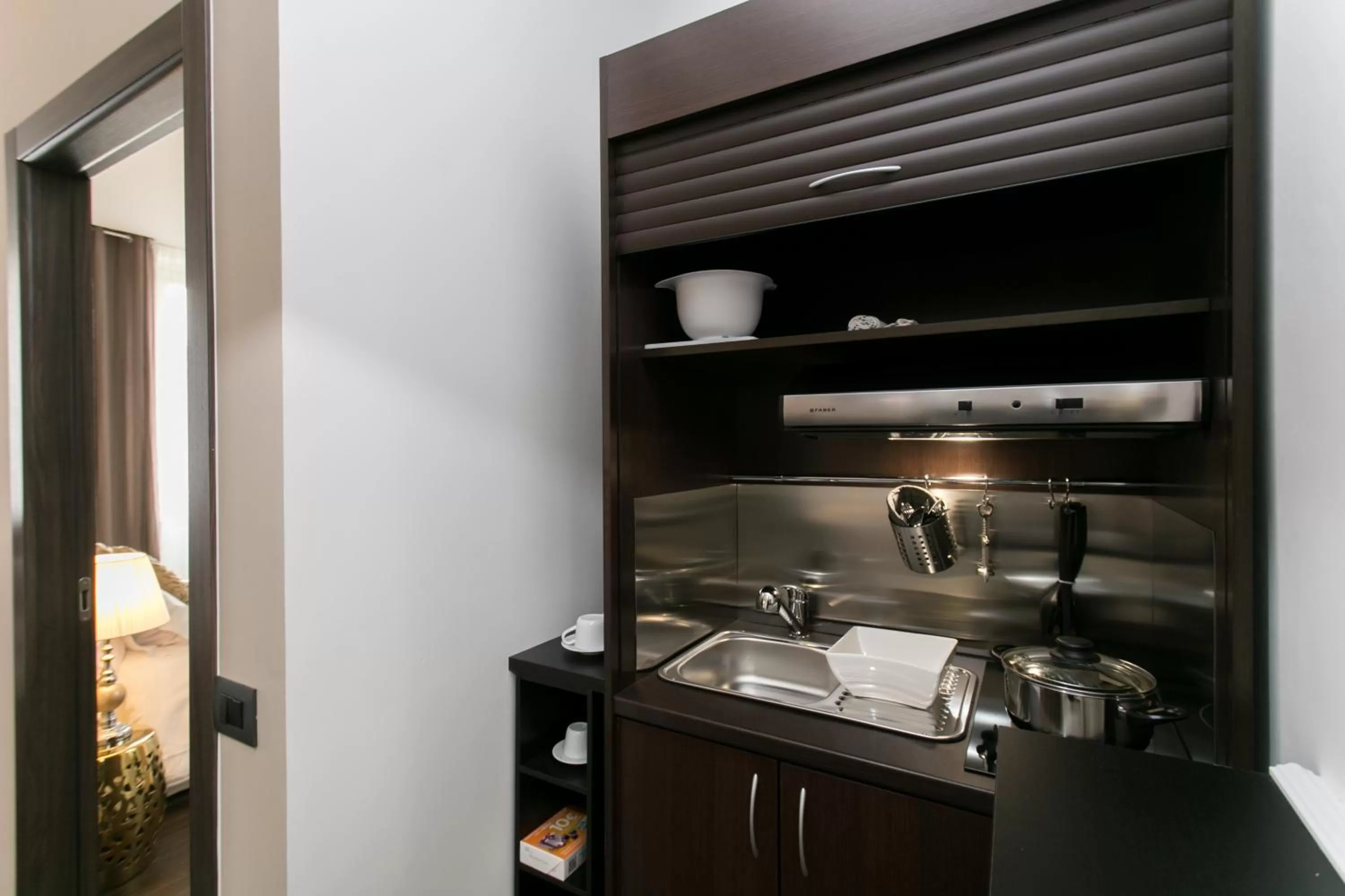 Kitchen or kitchenette in Aparthotel Dei Mercanti