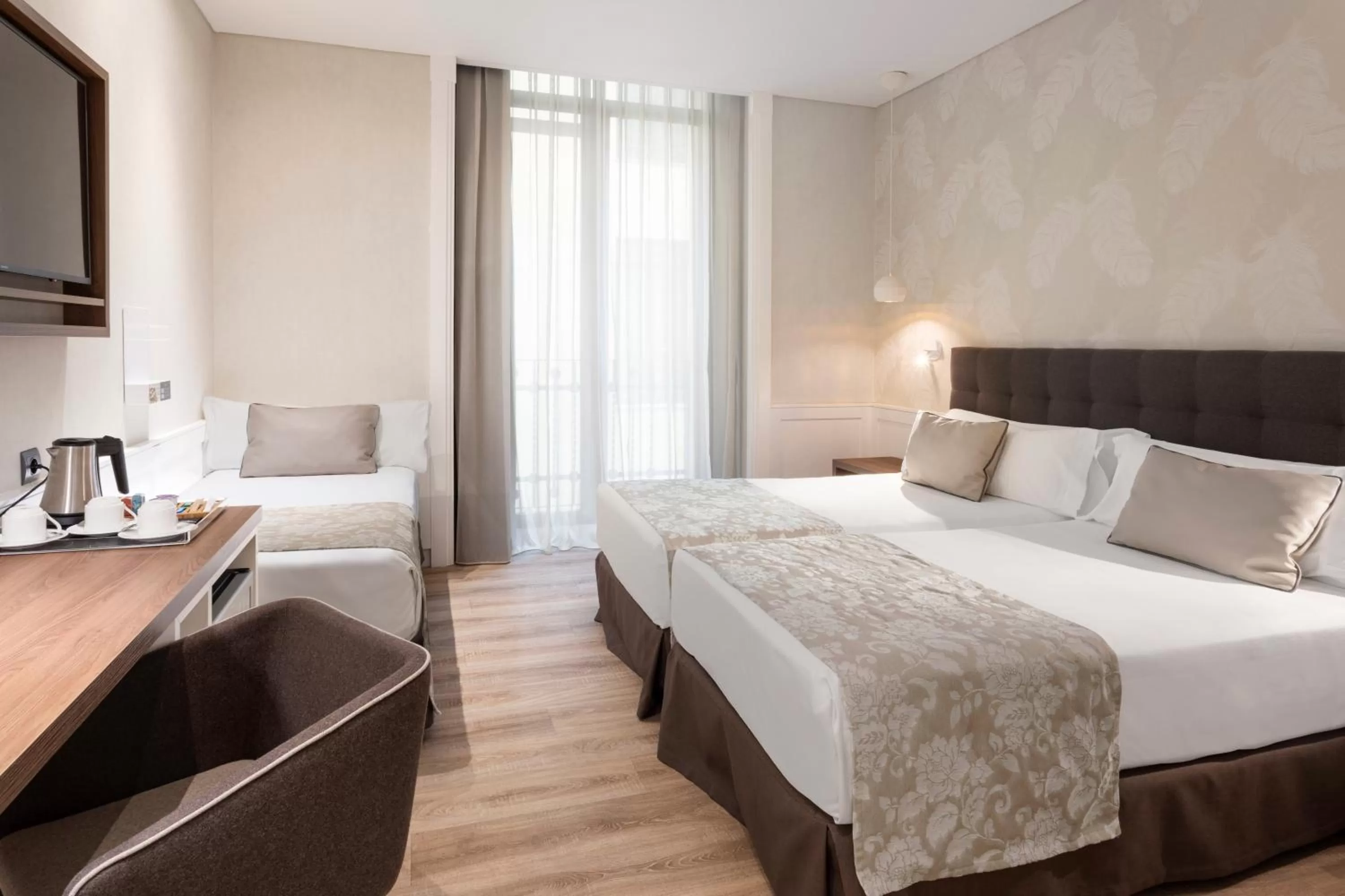 Triple Room (2 Adults + 1 Child) in Catalonia Puerta del Sol