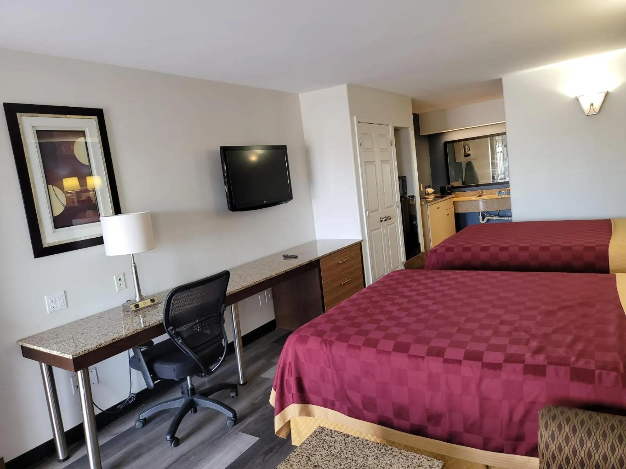 Bed in Texas Inn and Suites Raymondville