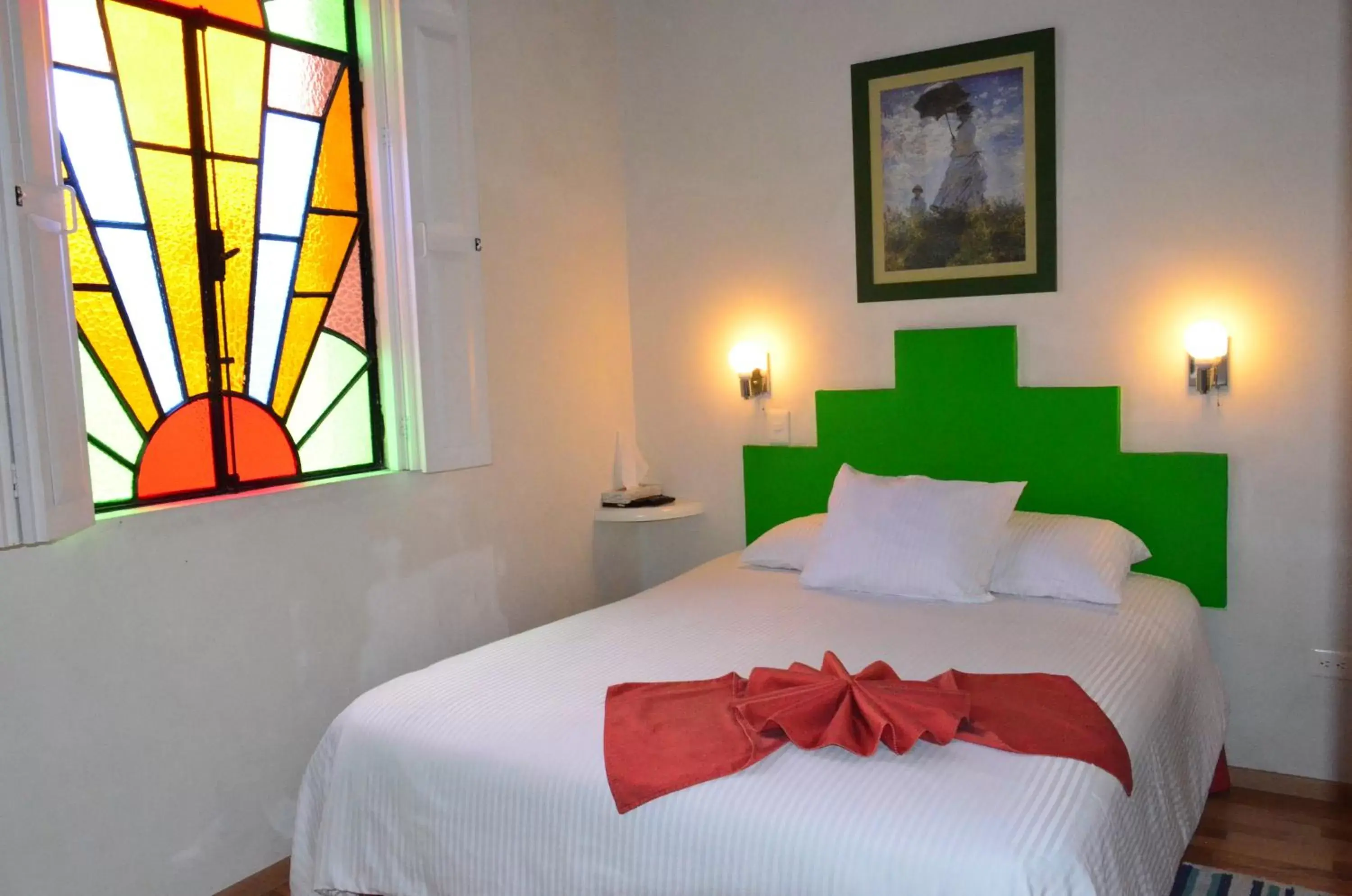 Bed in Hotel del Capitán de Puebla - Vitrales