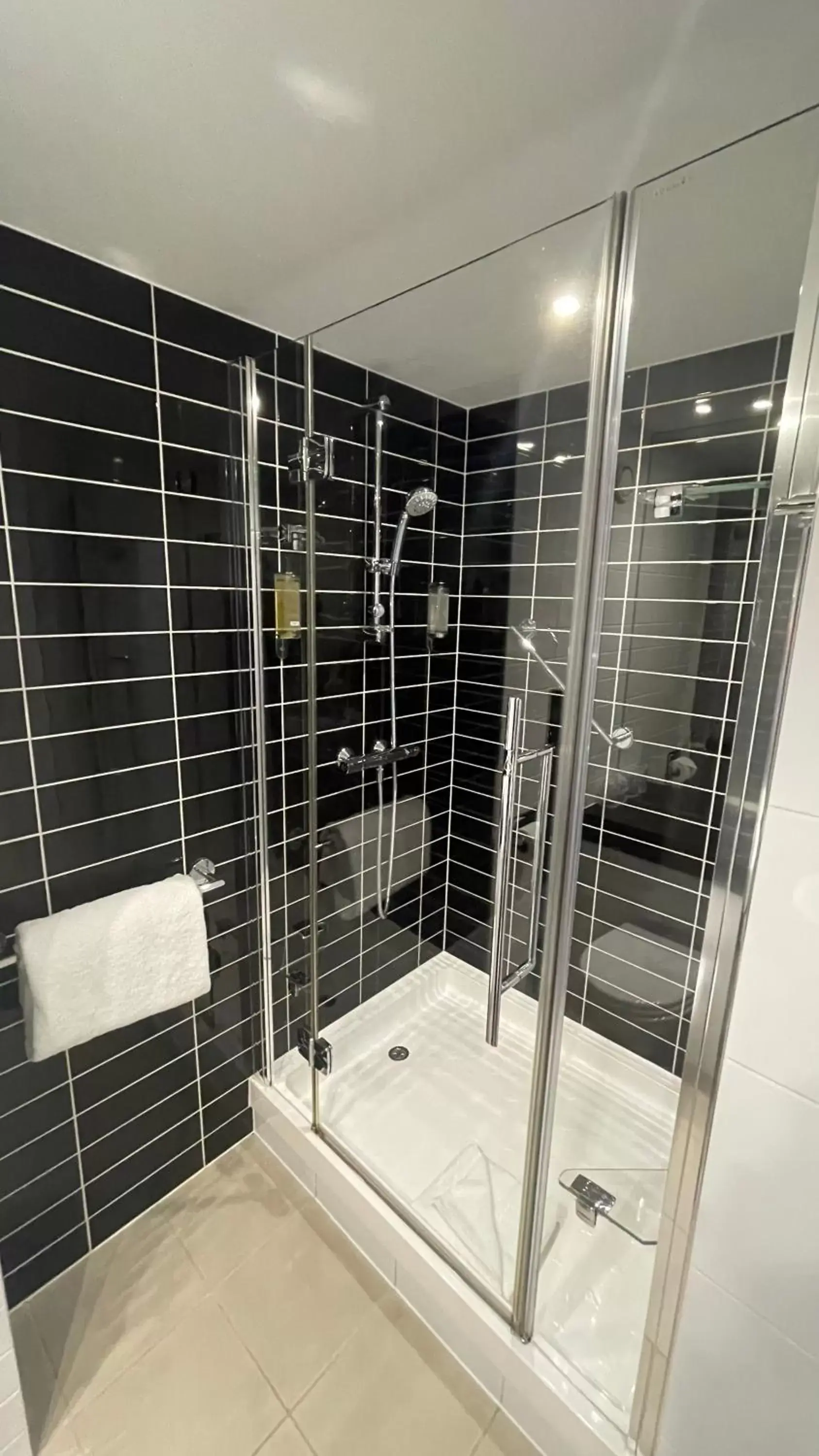 Shower, Bathroom in Holiday Inn Express Manchester City Centre Arena, an IHG Hotel