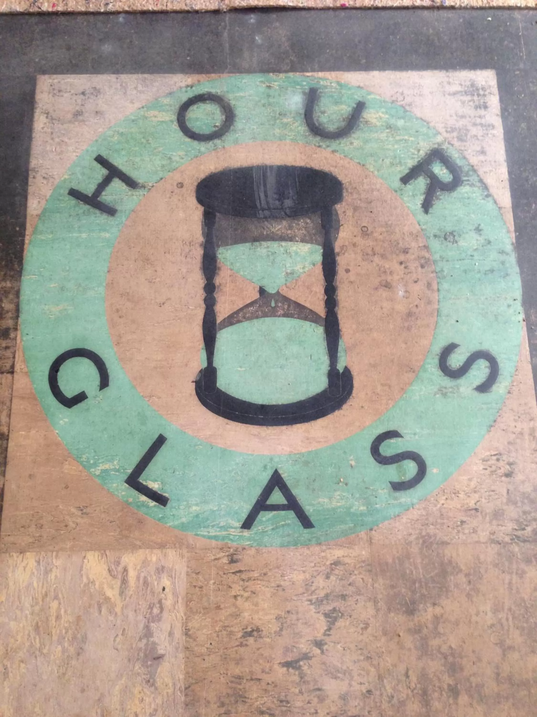 Property logo or sign in Hour Glass Hotel