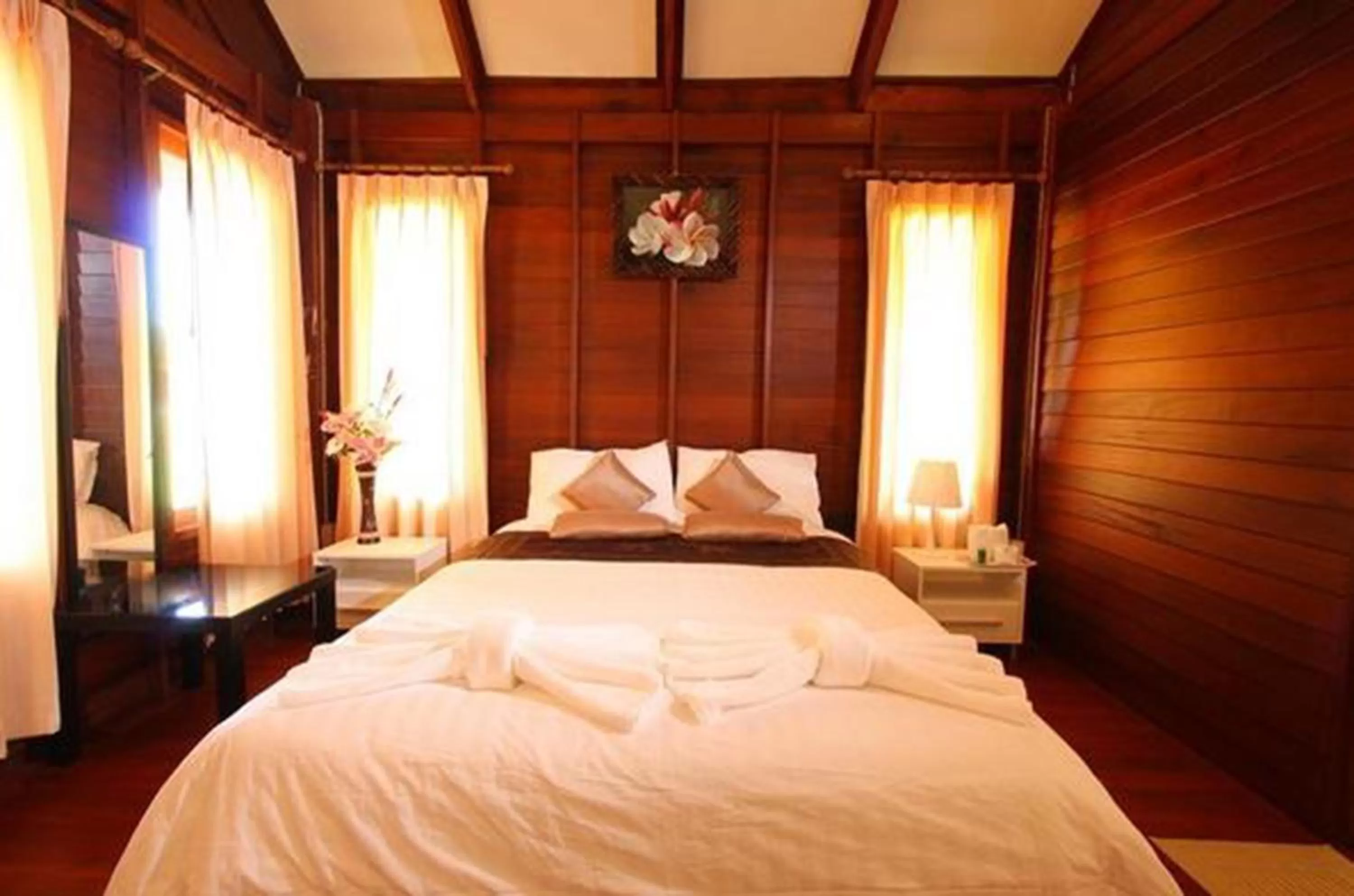 Bed in Panlaan Boutique Resort