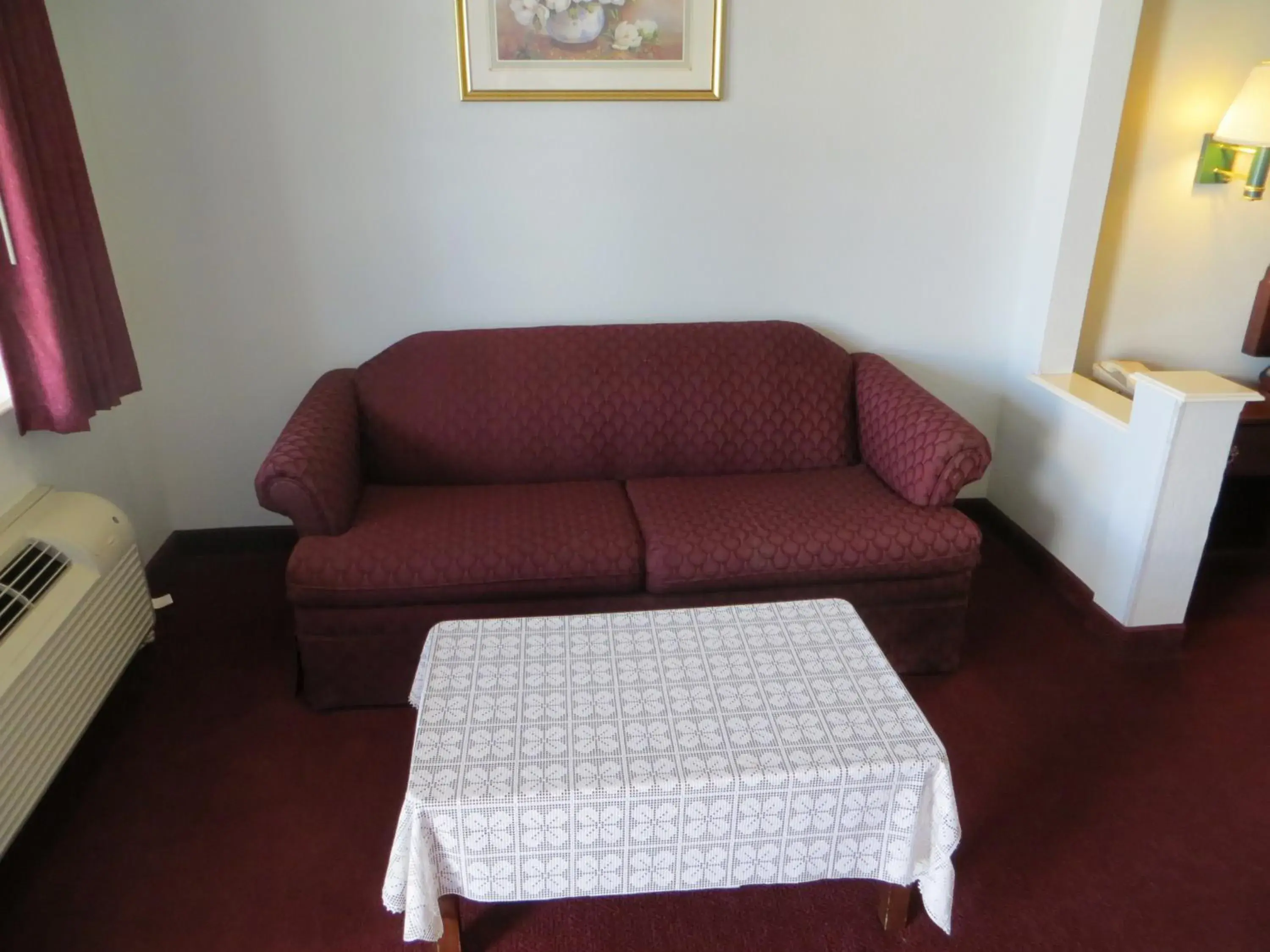 Bedroom, Seating Area in Executive Inn & Suites West Columbia