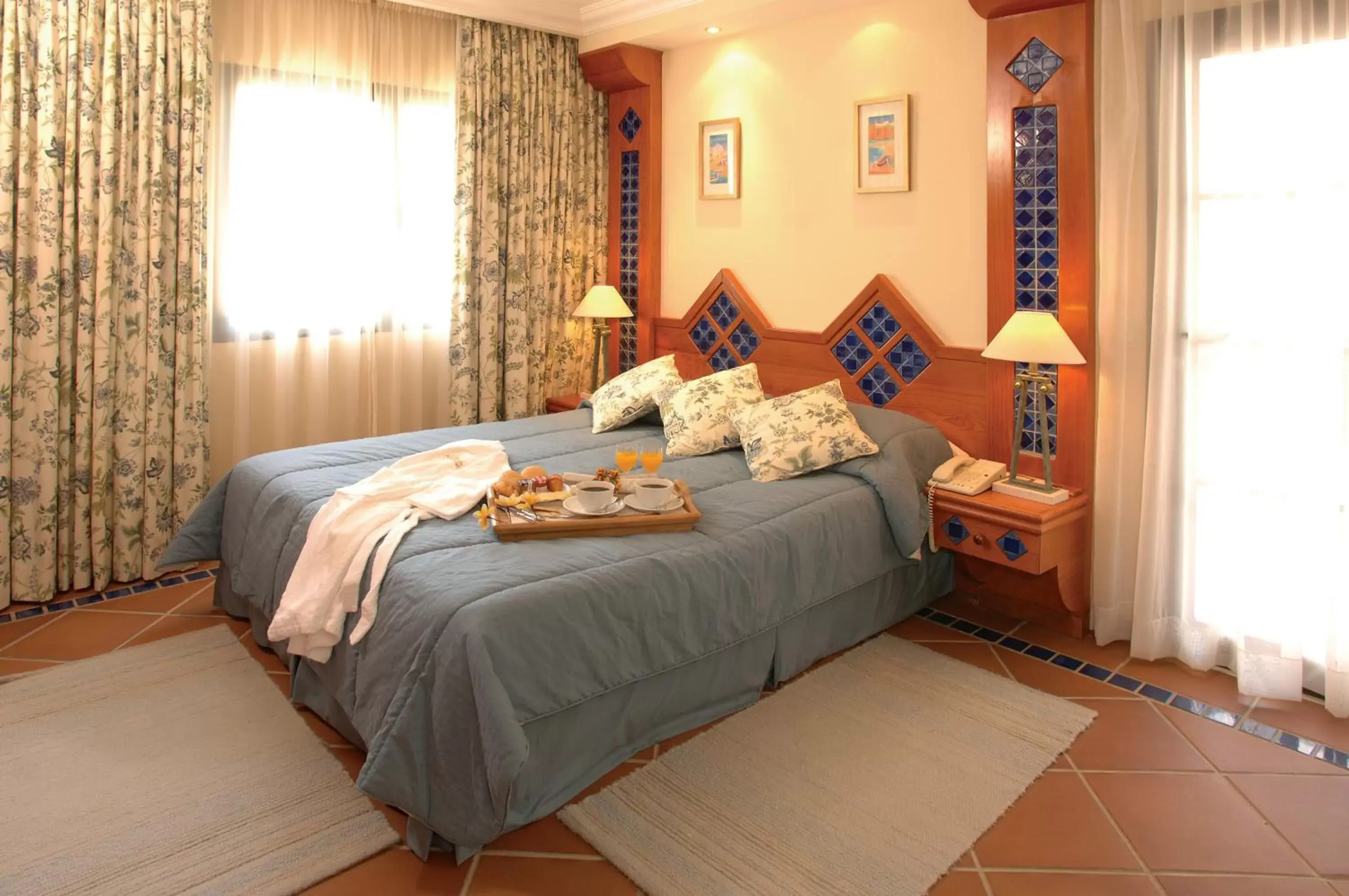 Bed in Pine Cliffs Village & Suites