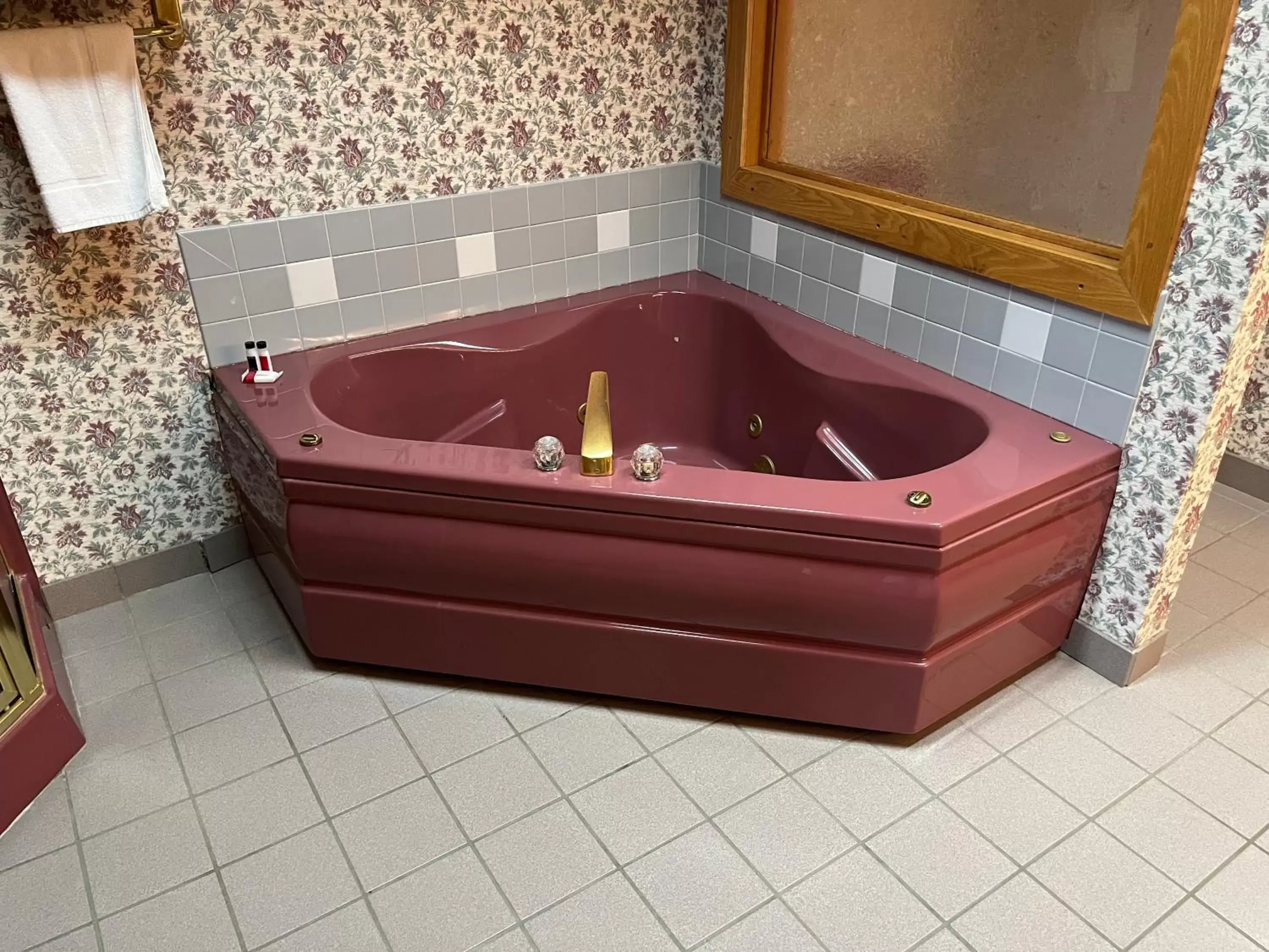 Bathroom in Days Inn & Suites by Wyndham Sutton Flatwoods Bathroom in Days Inn & Suites by Wyndham Sutton Flatwoods