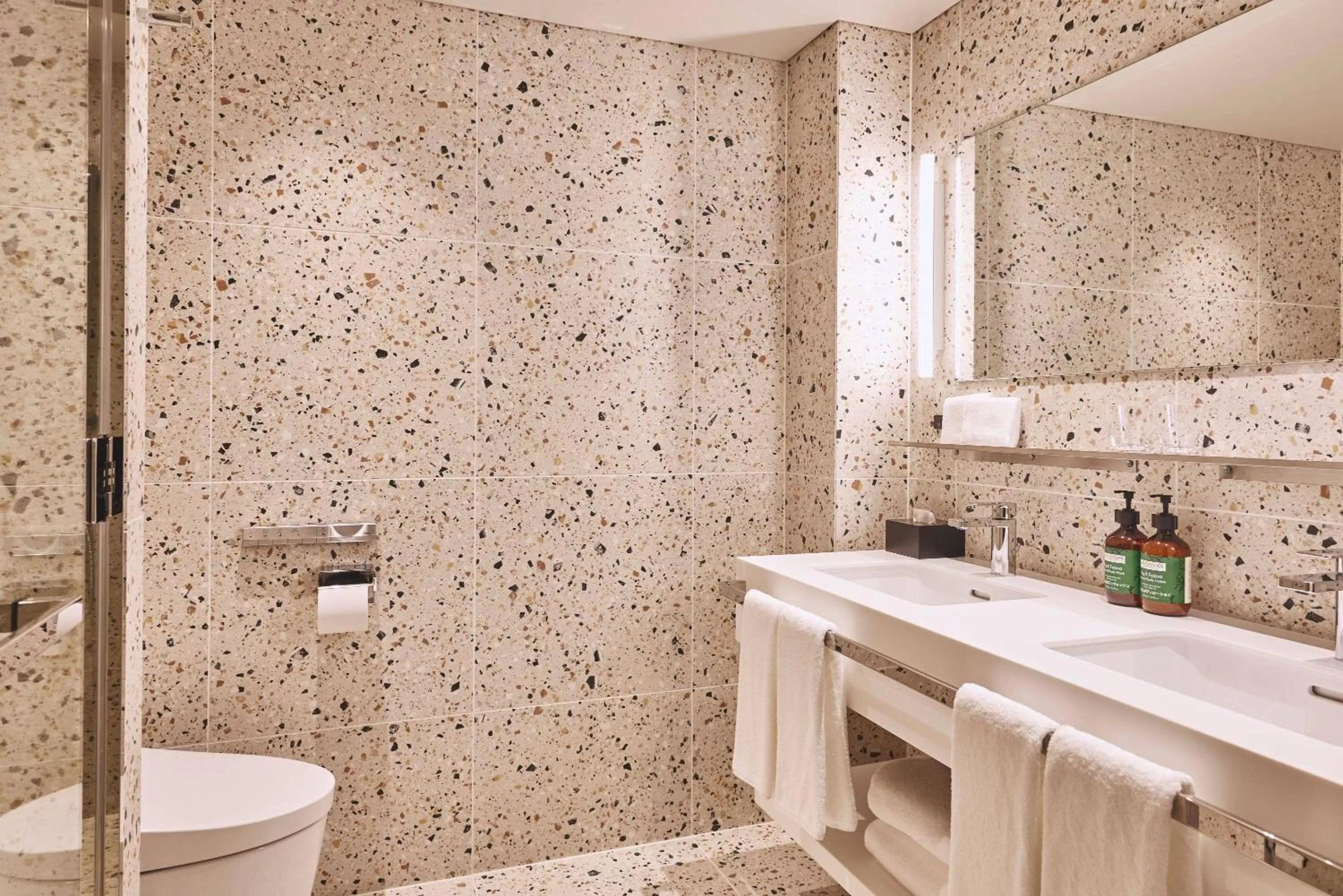 Bathroom in voco Osaka Central by IHG