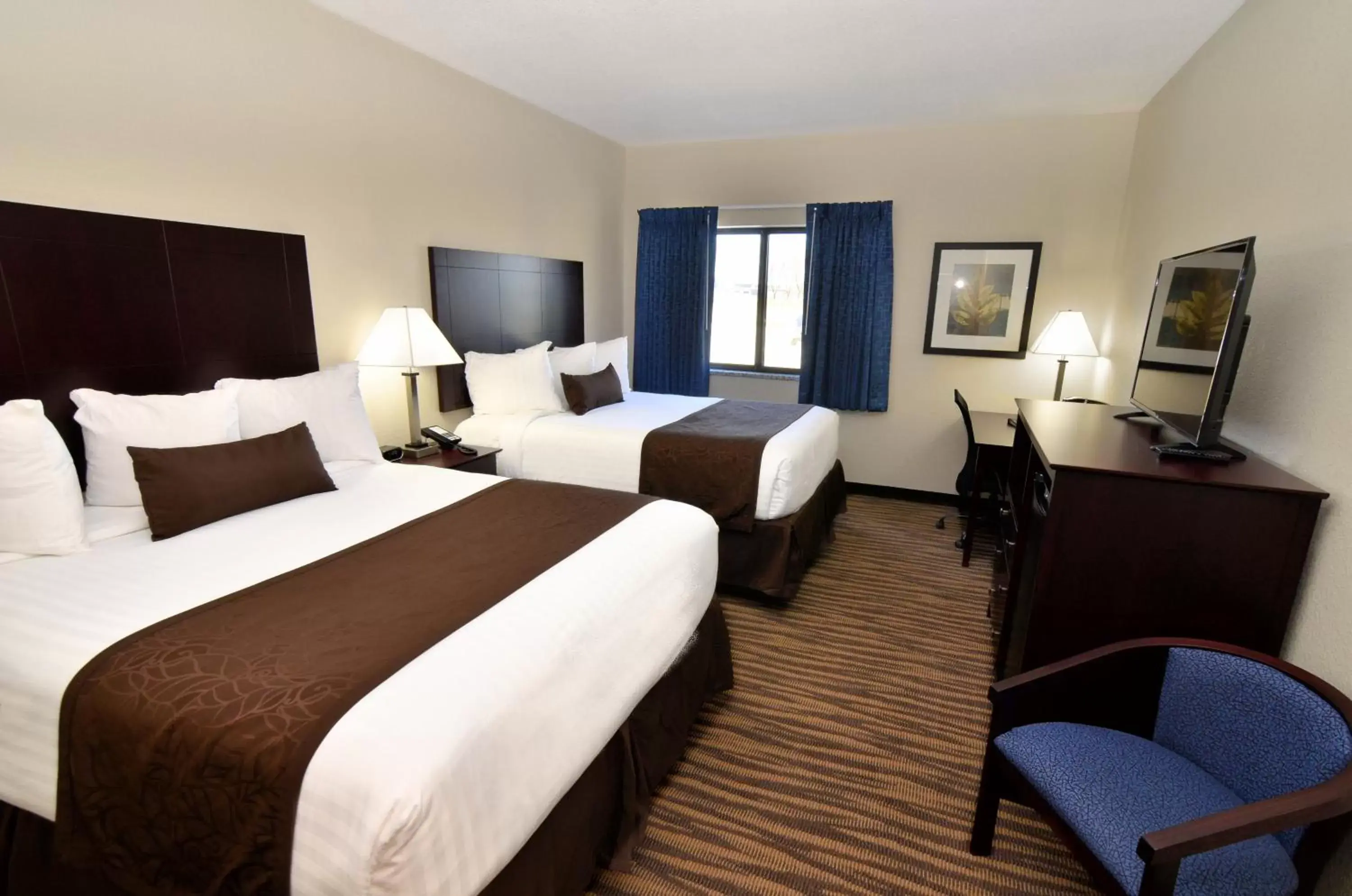 Bed in Cobblestone Inn & Suites - Manning