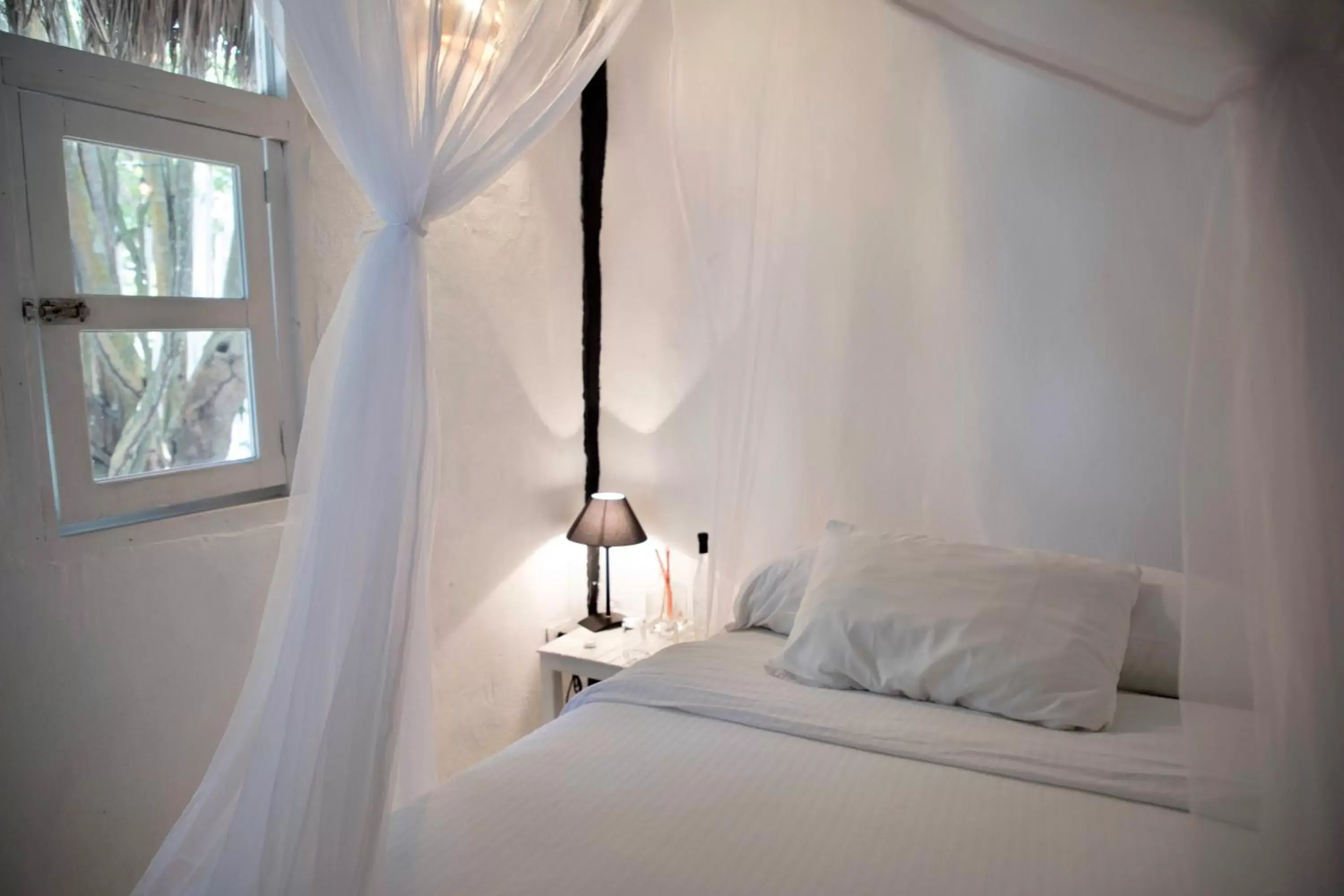 Bed, Room Photo in Coco Tulum Beach Club Hotel