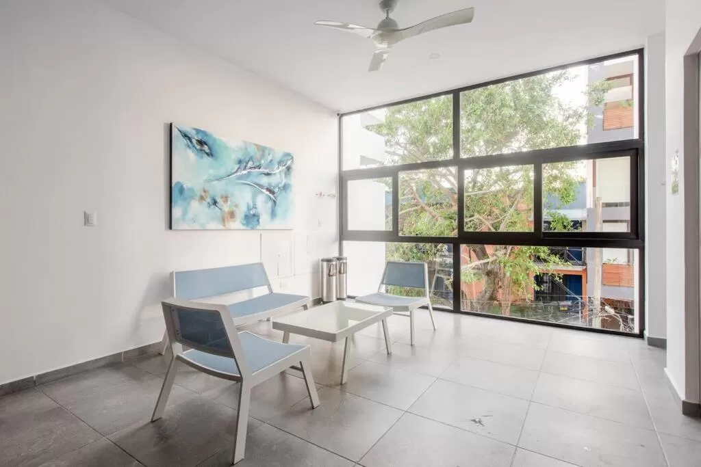 Seating area in Homely Studio or OneBR in Playa del Carmen w Balcony, BBQ, Pool Infinite, AC, TV Smart, 60mb