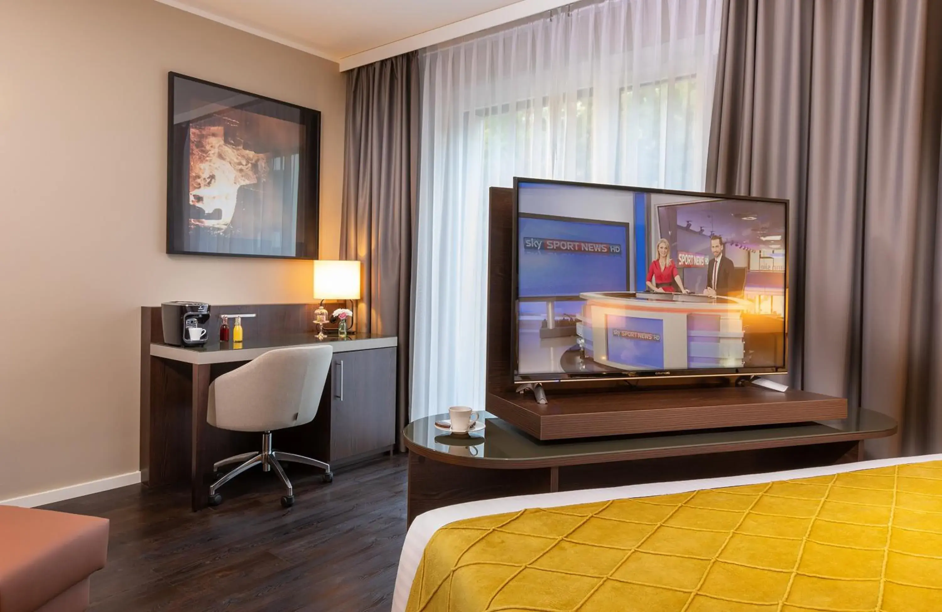 Photo of the whole room, TV/Entertainment Center in Leonardo Hotel Dortmund