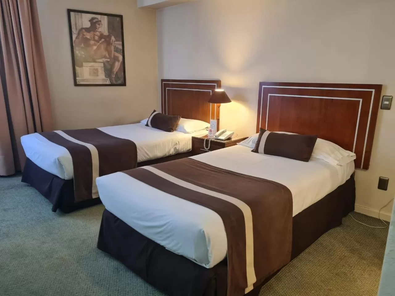 Bed in Hotel Leonardo da Vinci