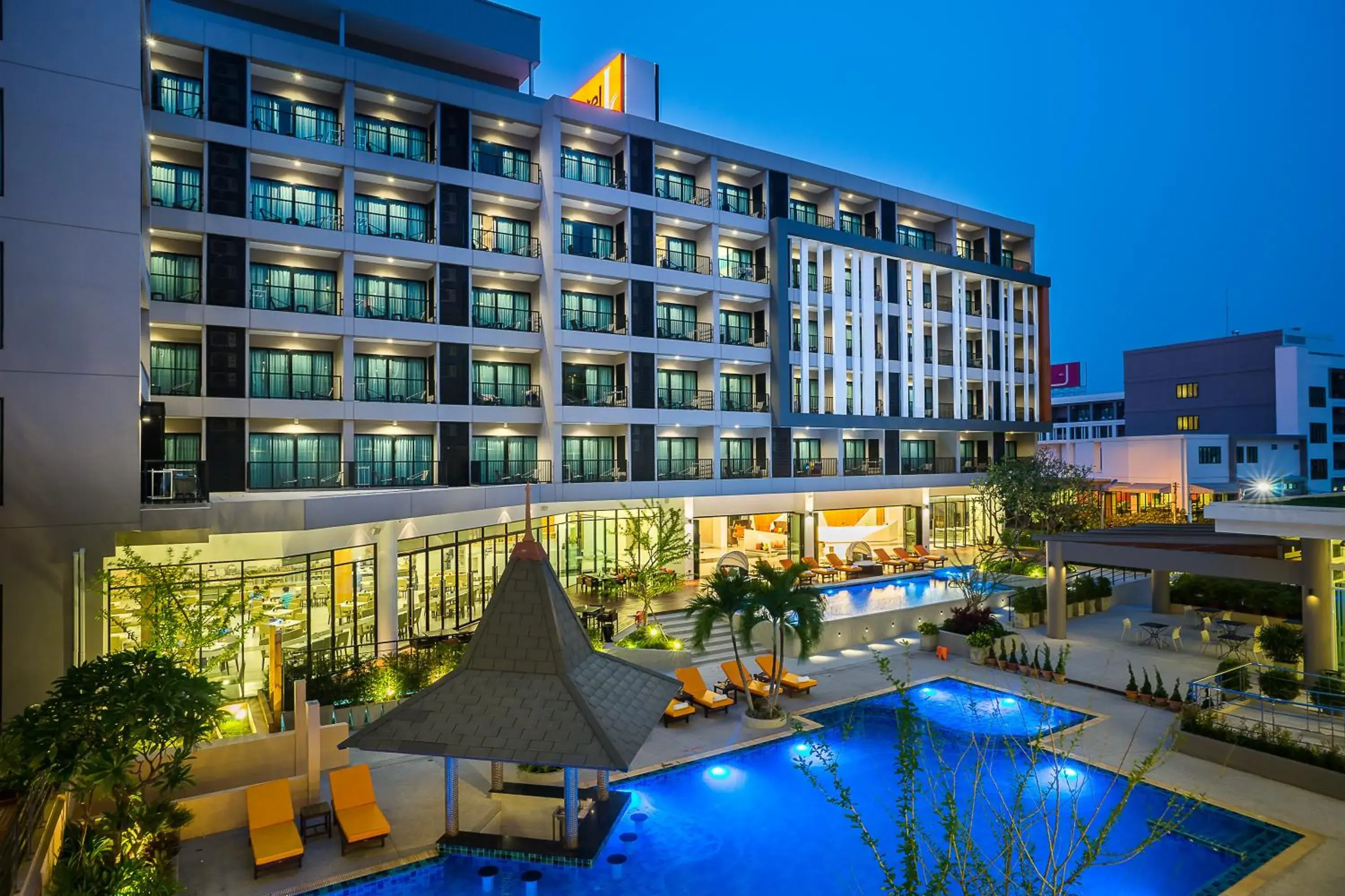 Swimming pool, Property Building in J Inspired Hotel Pattaya (SHA Plus)