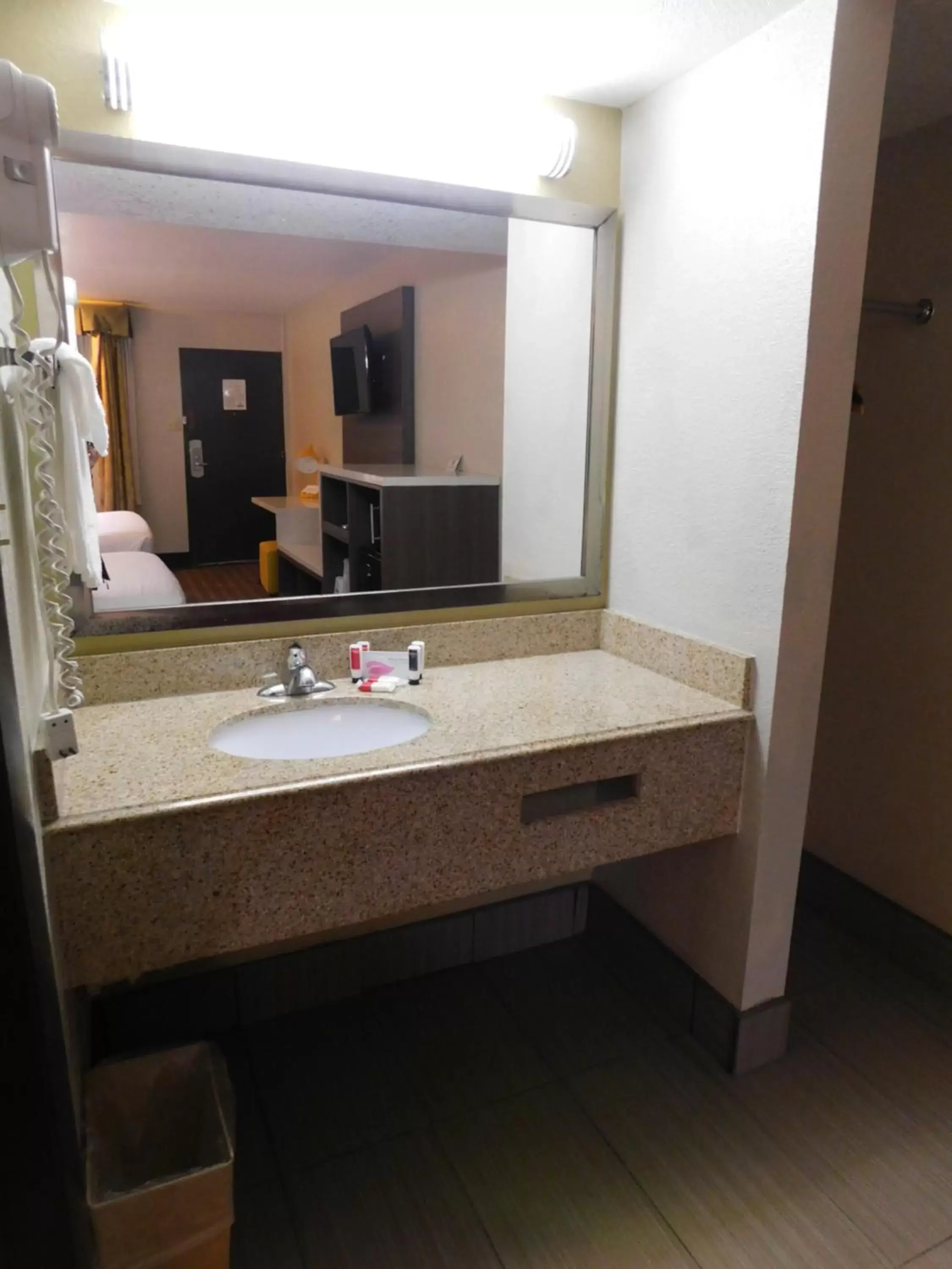 Bathroom in Days Inn & Suites by Wyndham Downtown Gatlinburg Parkway