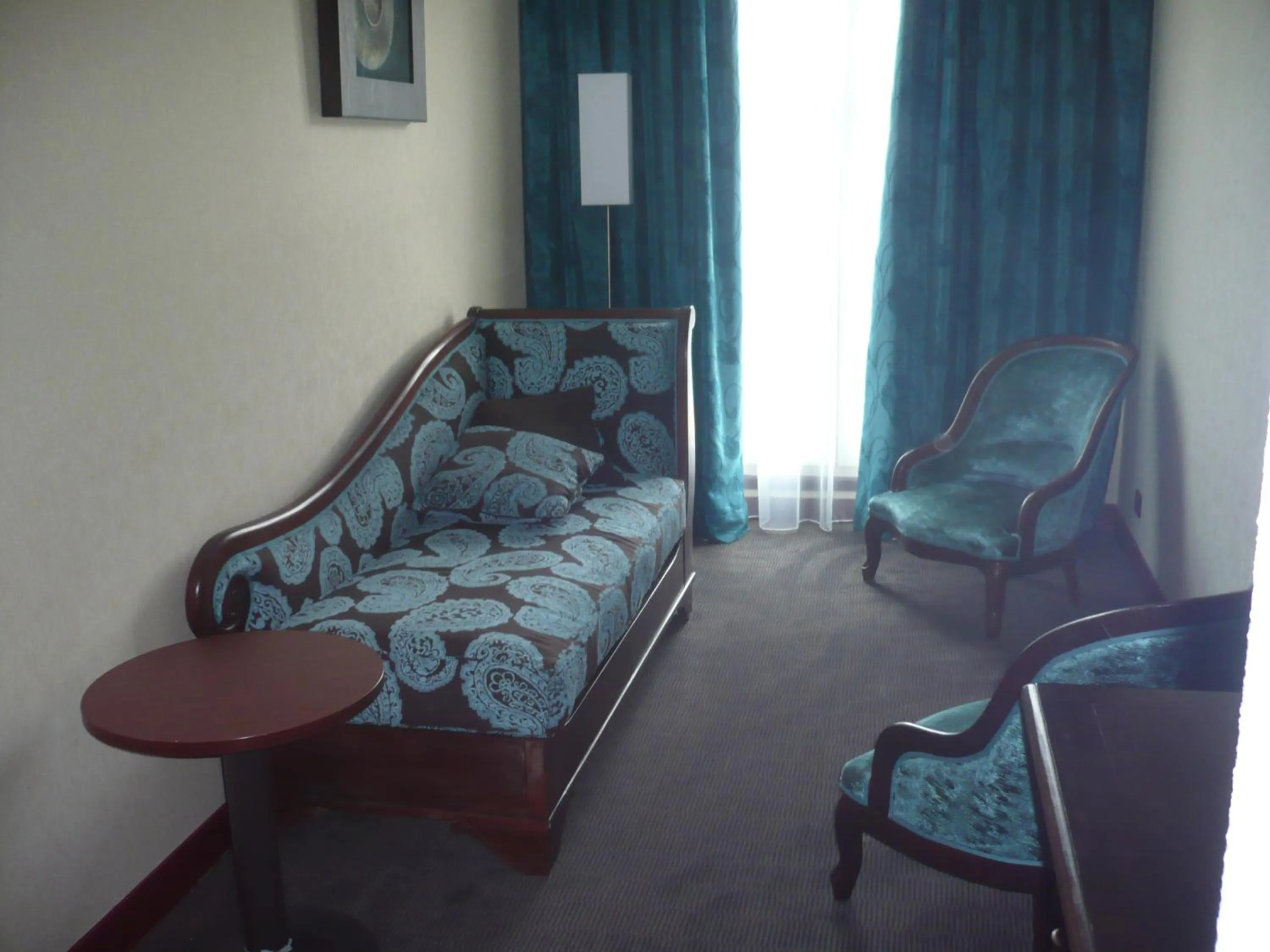 Seating area, Bed in Hotel De France