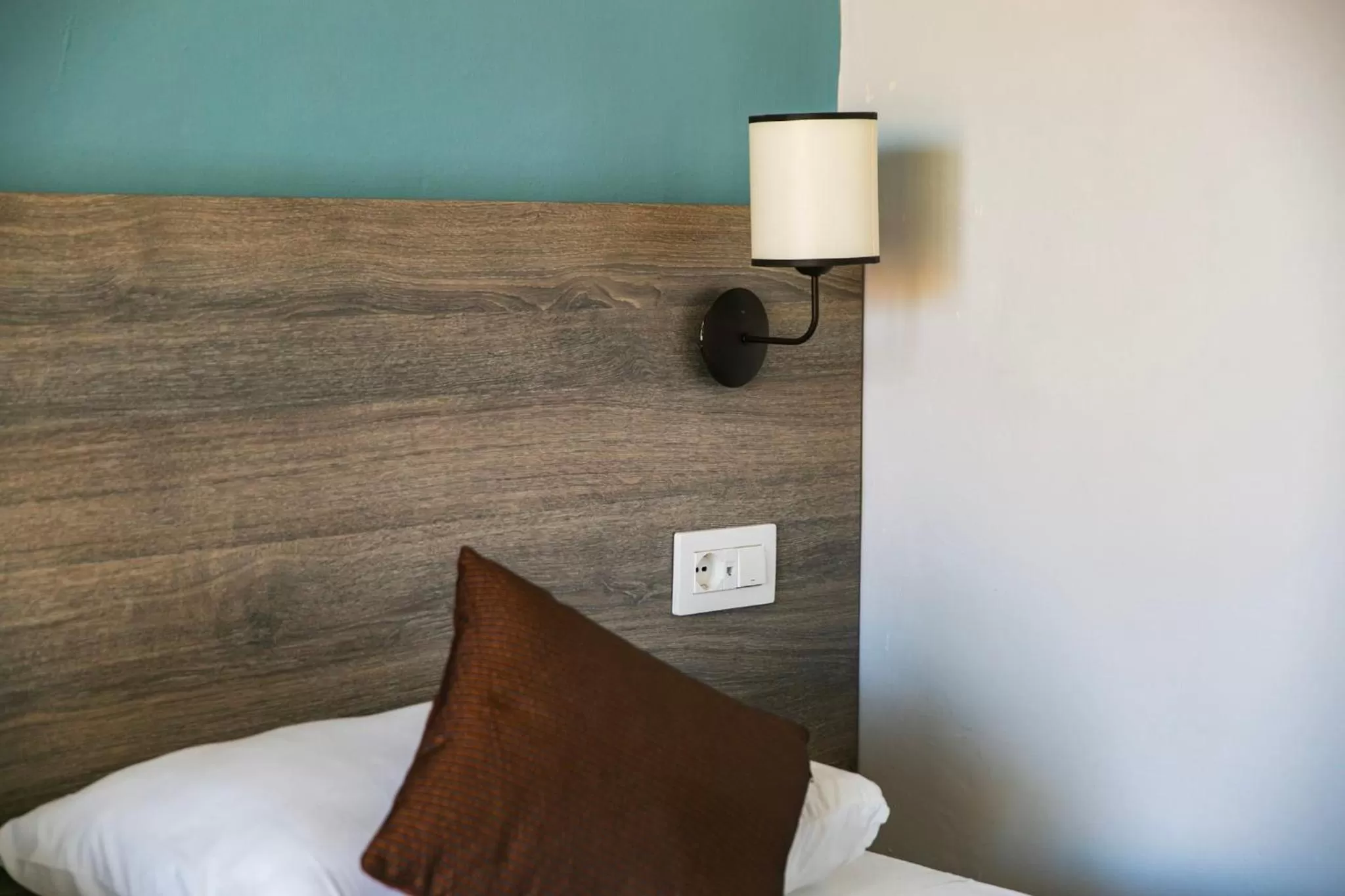 Bed in Beach Garden Hotel